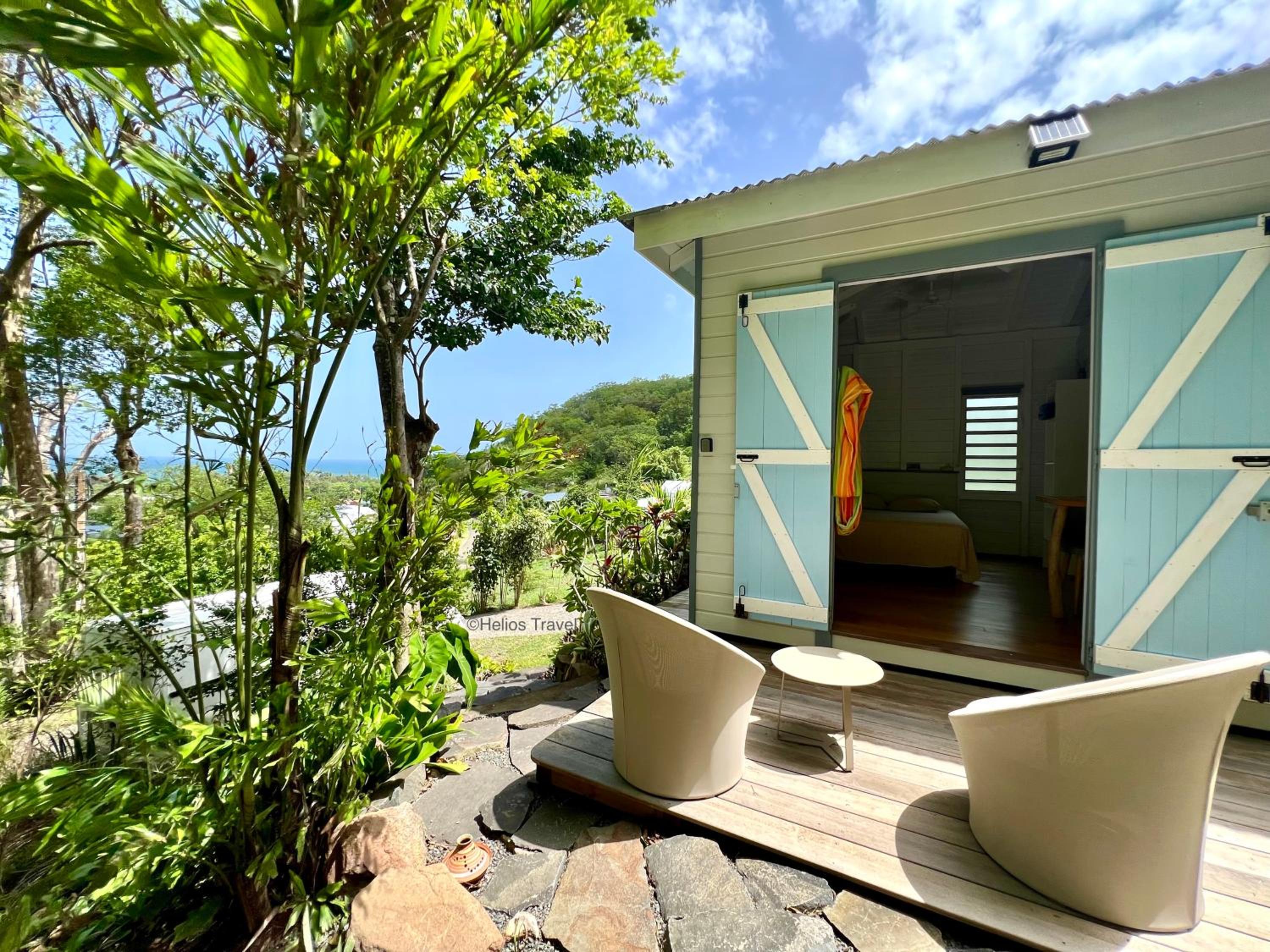 Le Surf Lodge, chambre avec vue mer dans un écrin de verdure view 4