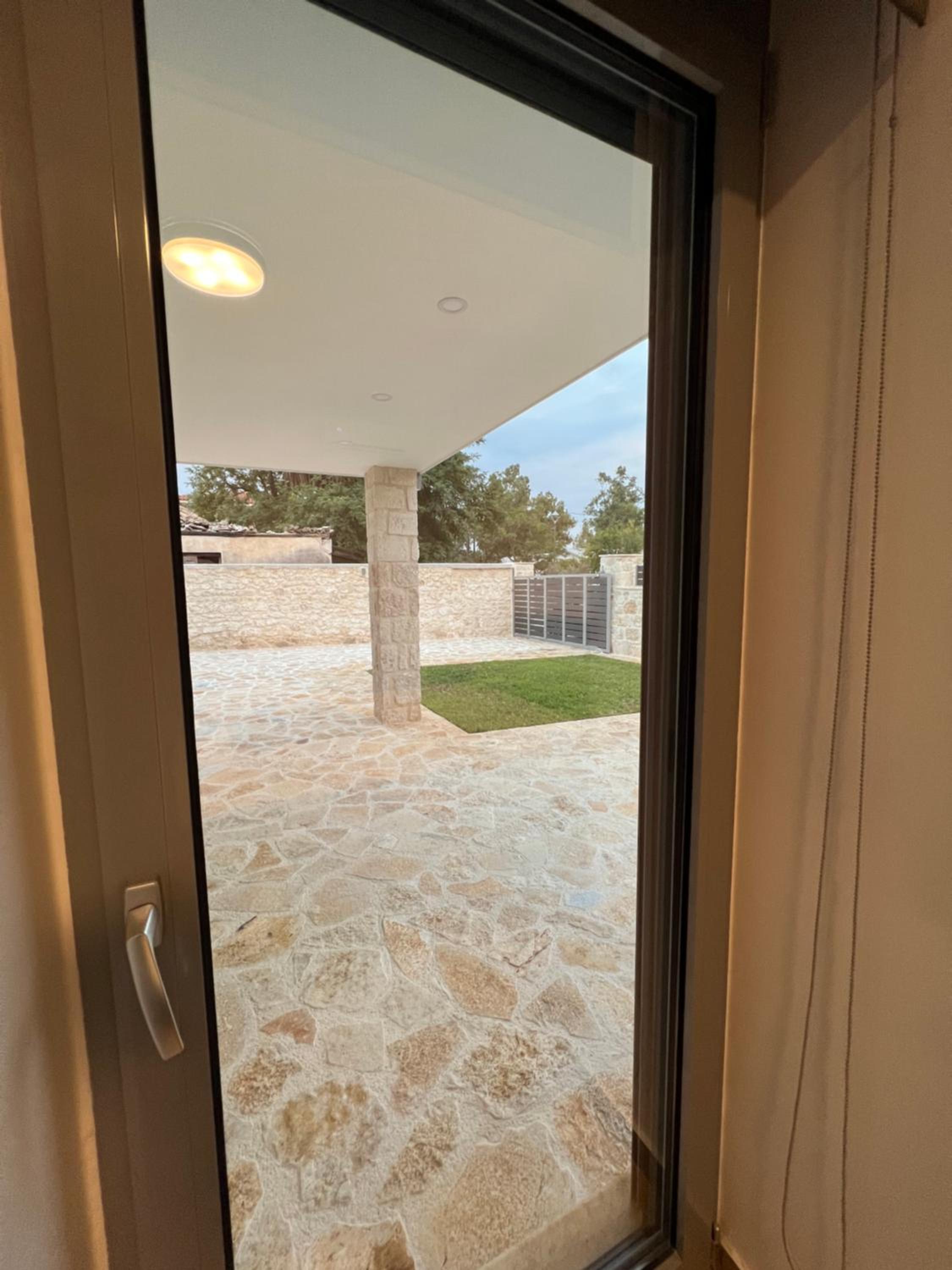 AG Stone Home - Idyllic Beachside Villa in Isthmia