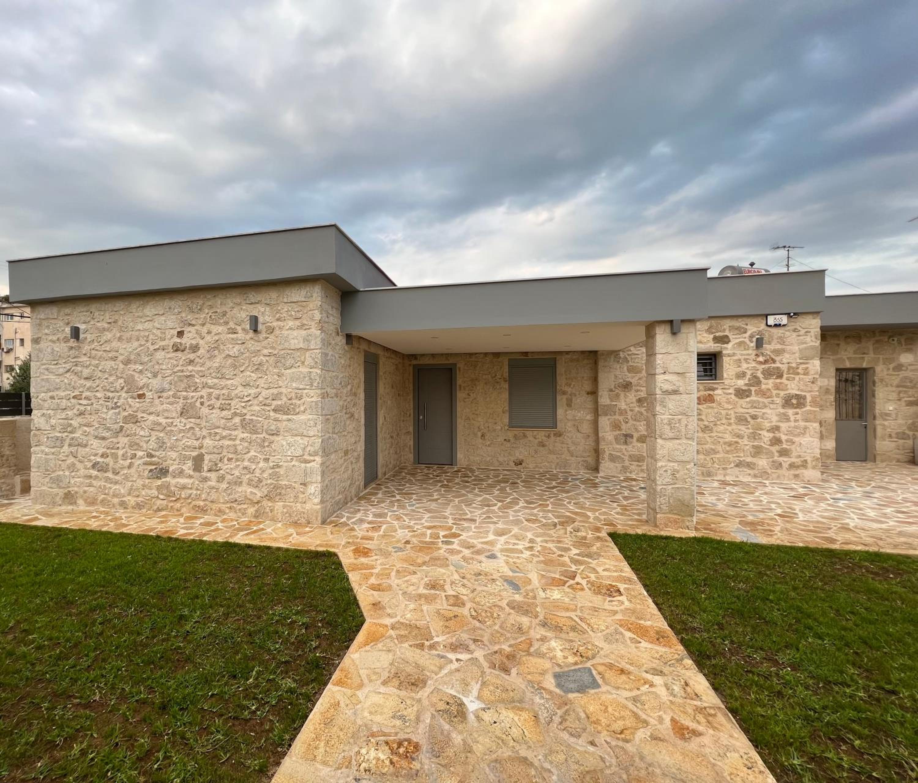 AG Stone Home - Idyllic Beachside Villa in Isthmia