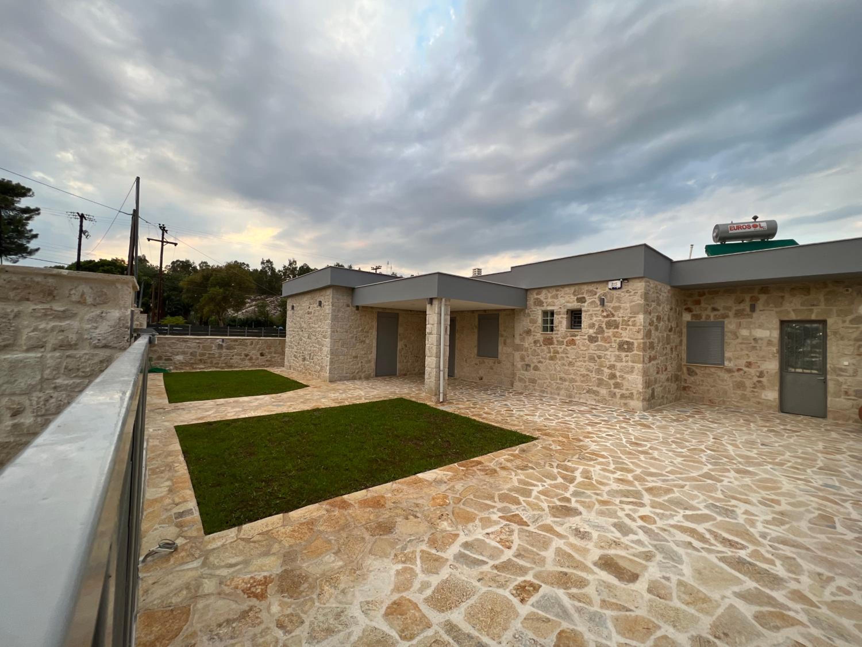 AG Stone Home - Idyllic Beachside Villa in Isthmia