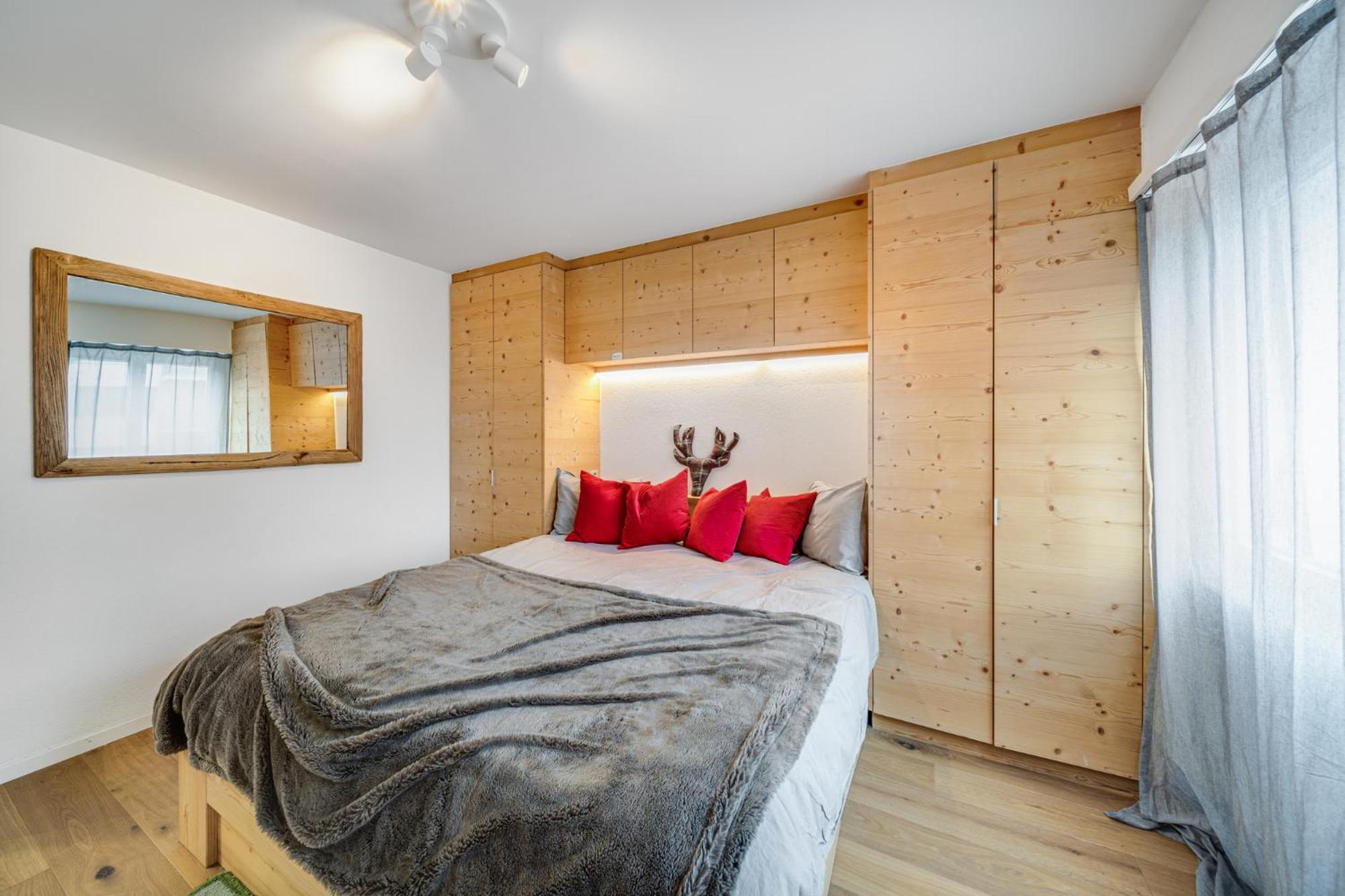 In the heart of Crans, fireplace and parking view 2