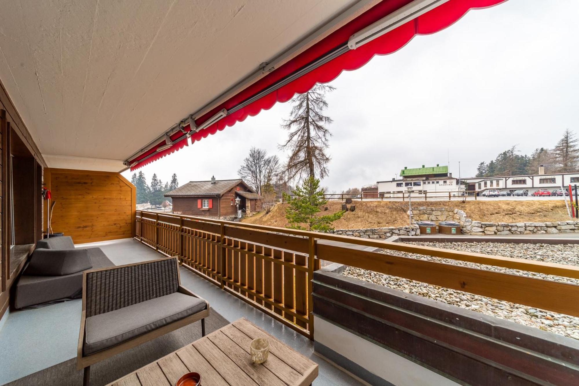 In the heart of Crans, fireplace and parking view 3