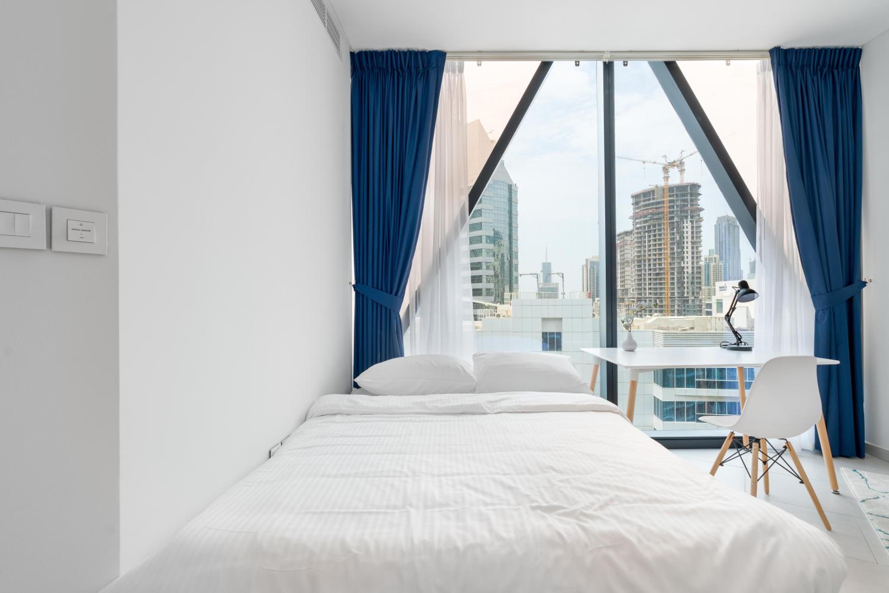 Ultimate Stay / 4 Beds / Burj Khalifa View / Ultra Modern / Business Bay