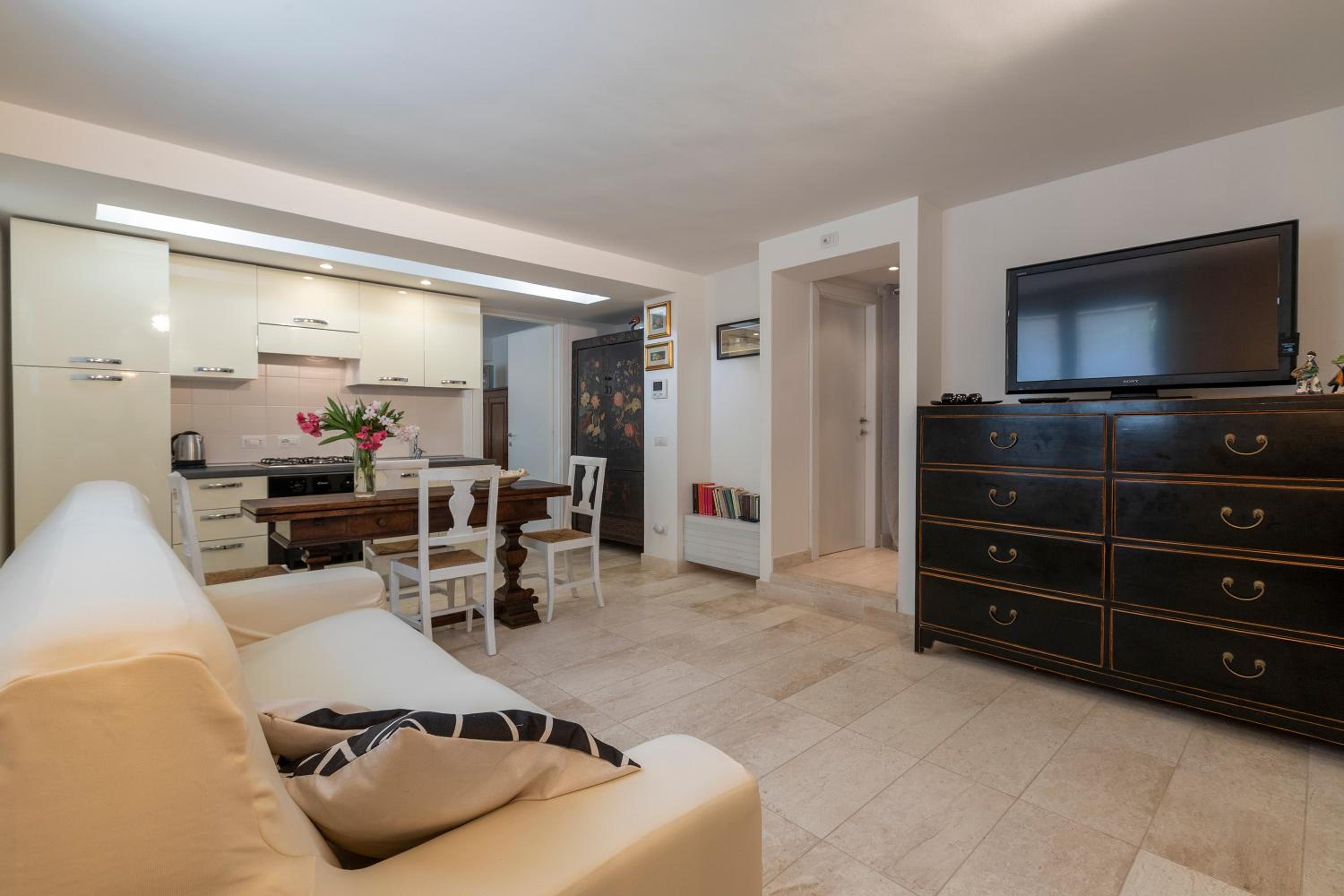 Charming Seafront Apartment with garden and patio