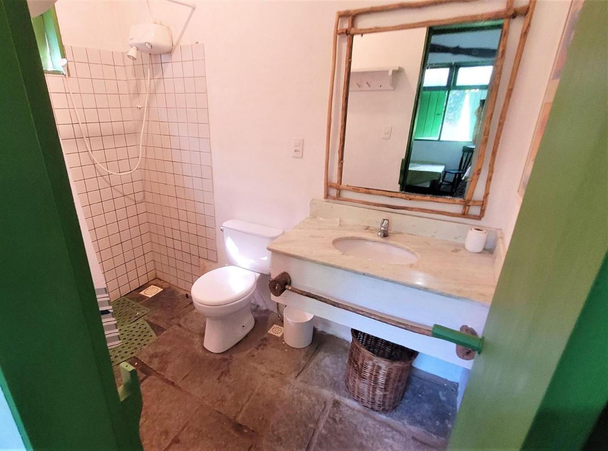 Linda casa com piscina a poucos passos da praia