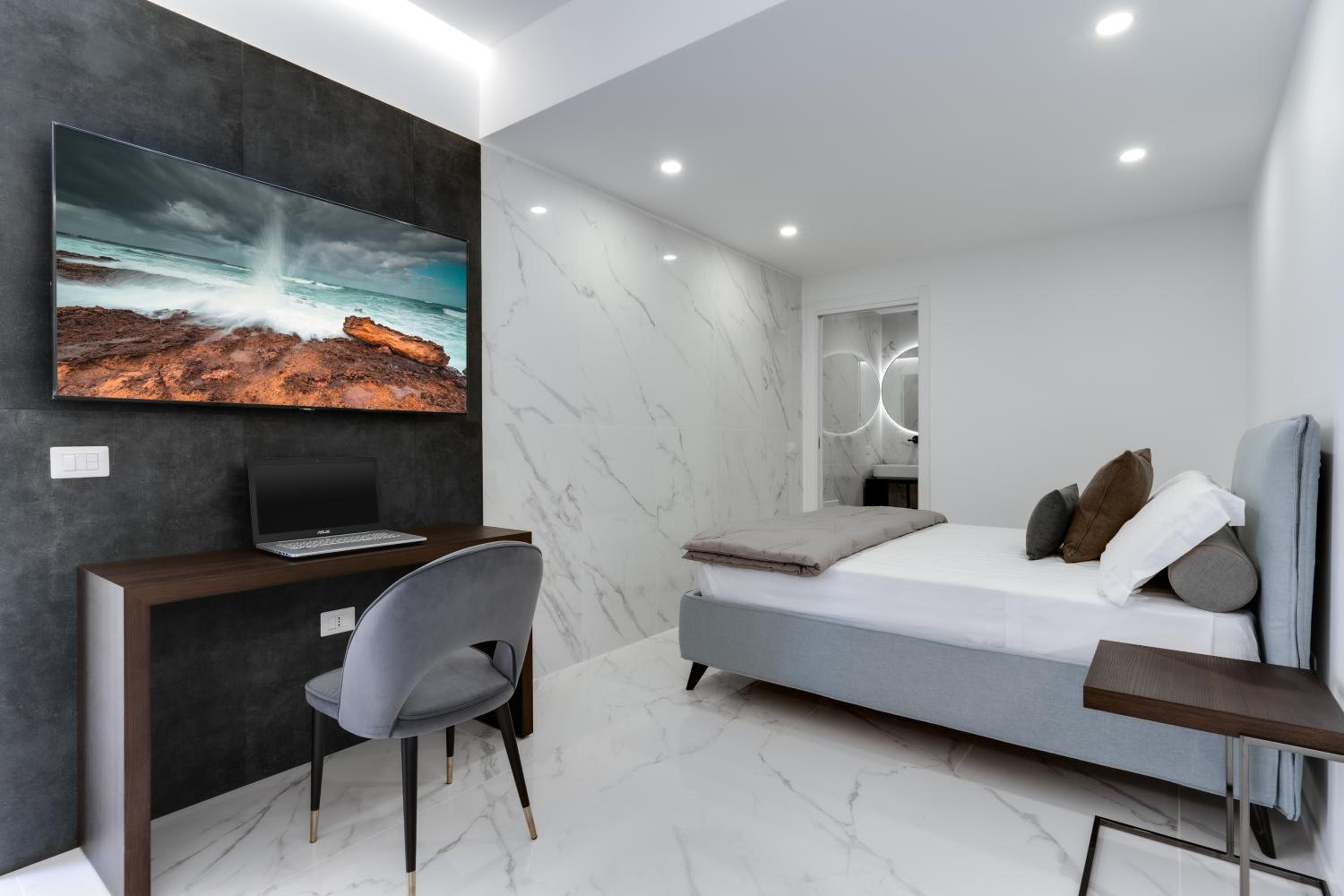 Caralis Suites Rooms