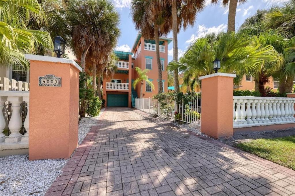 Tropical luxury pool home by the beach with roof top lounge centrally located on Anna Maria Island view 2