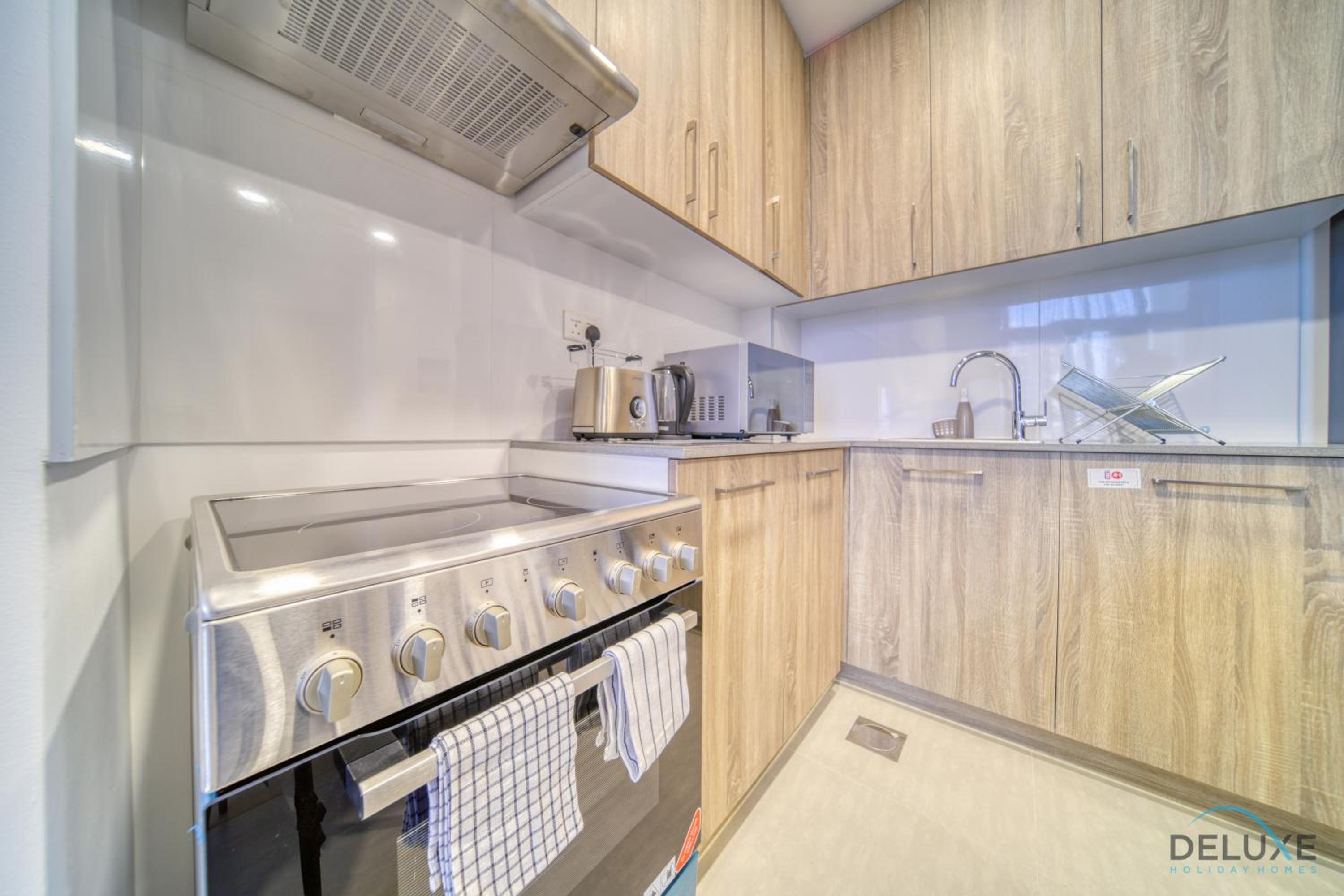 Sophisticated 1BR at Town Square Rawda Dubailand by Deluxe Holiday Homes