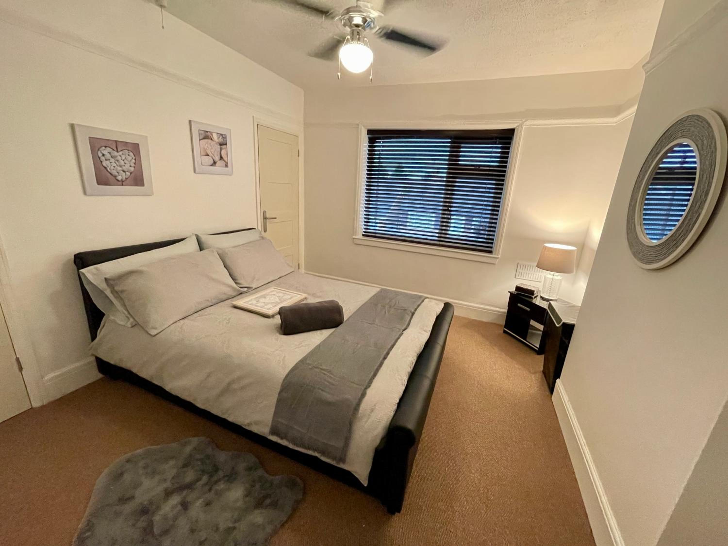 Delightful 2 bed detached home with secure parking view 2