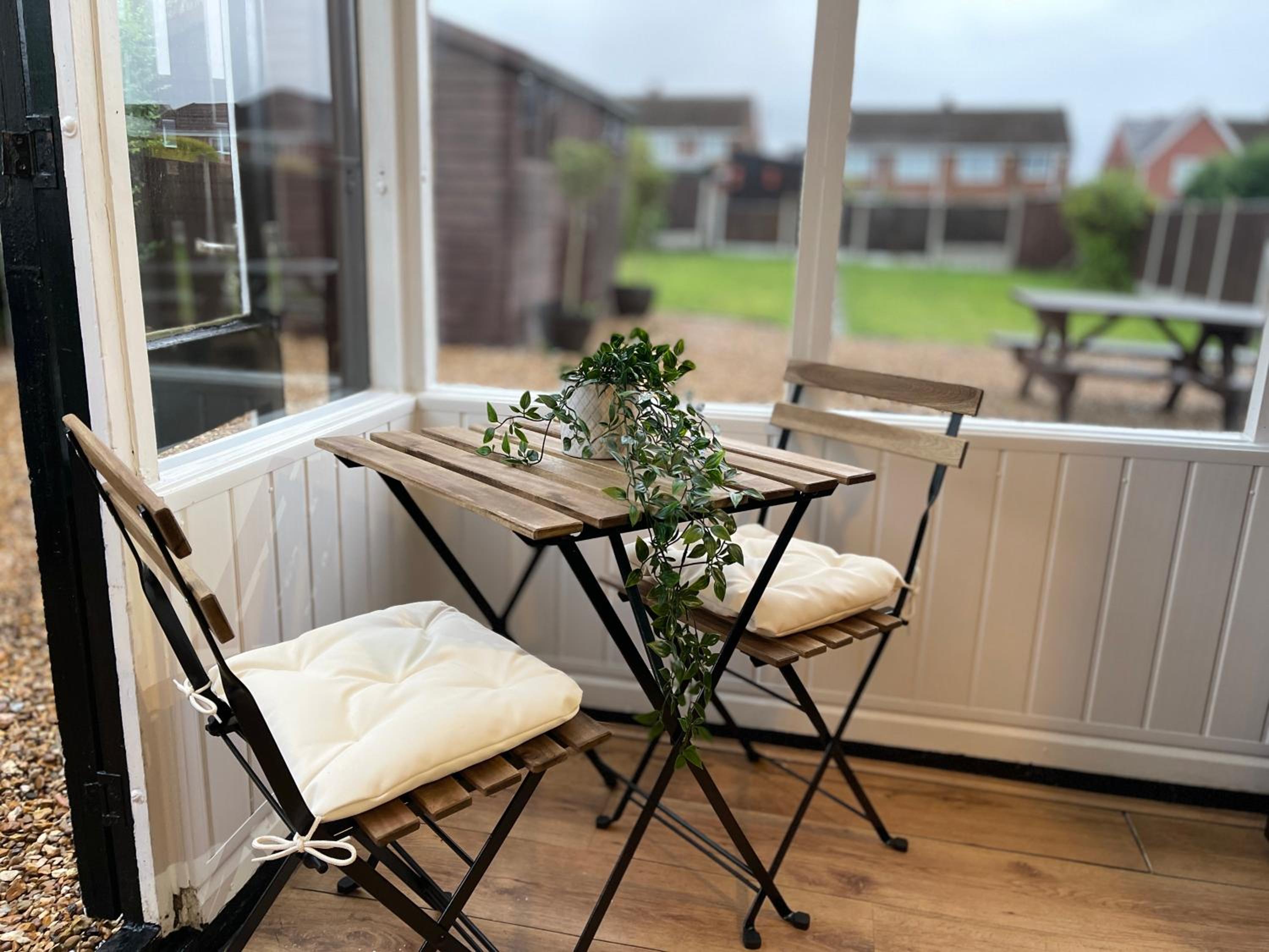 Delightful 2 bed detached home with secure parking view 4