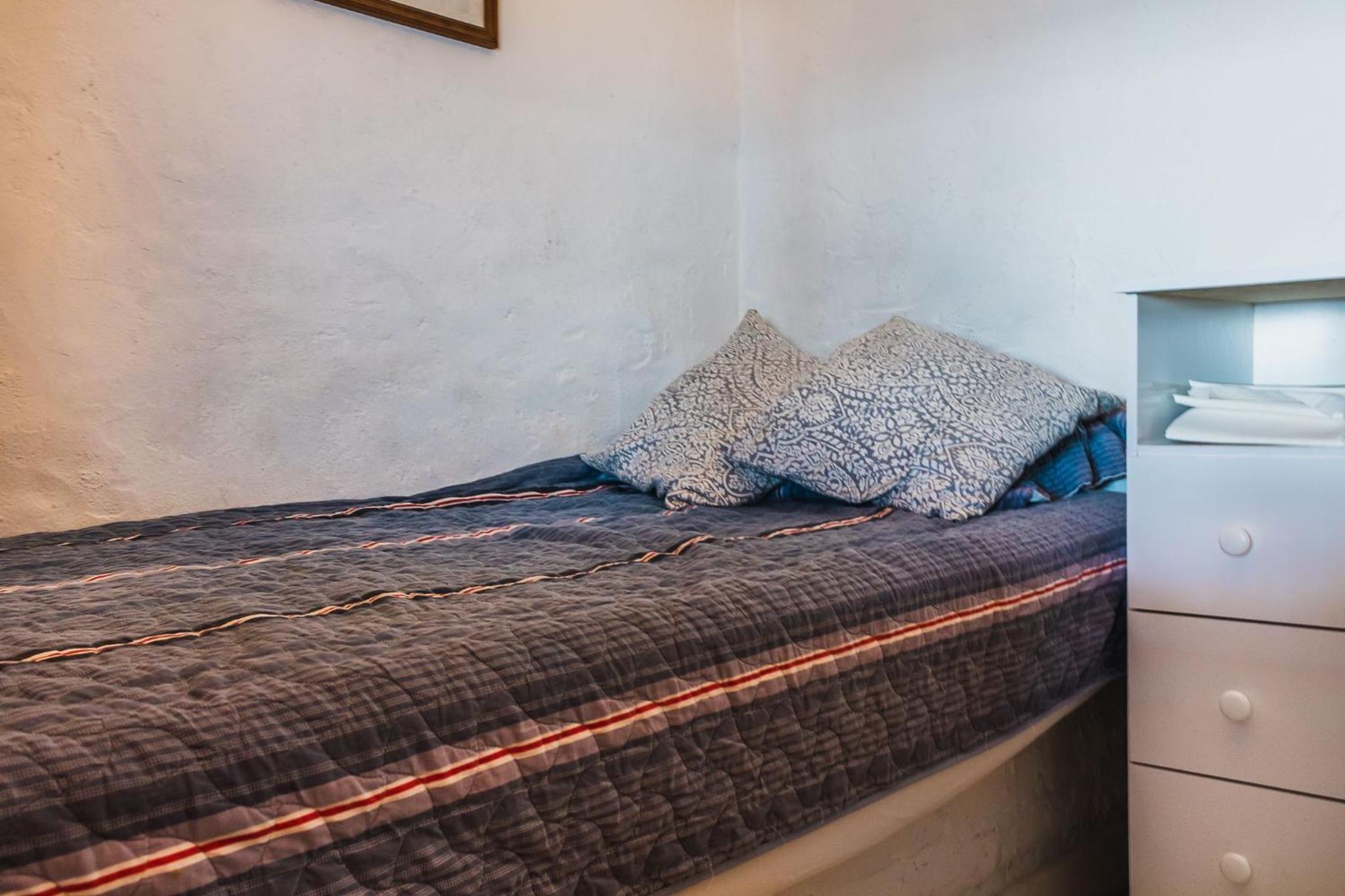 Casa pé na areia com varanda na Praia da Armação
