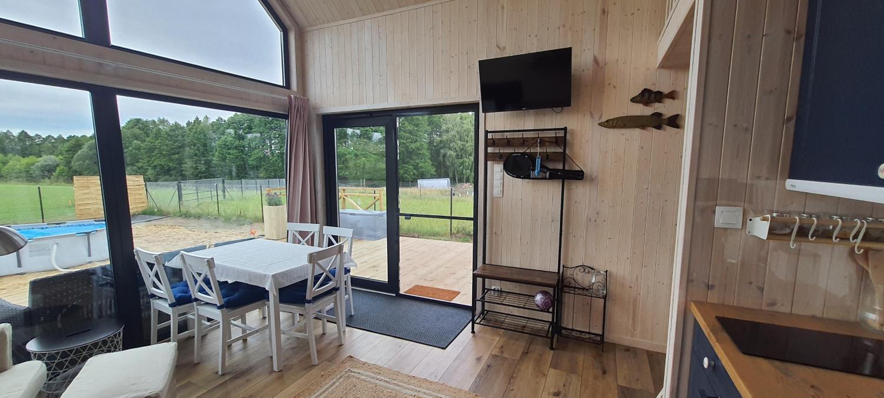 Domek Mazurski całoroczny nad jeziorem z sauną i Jacuzzi SPA
