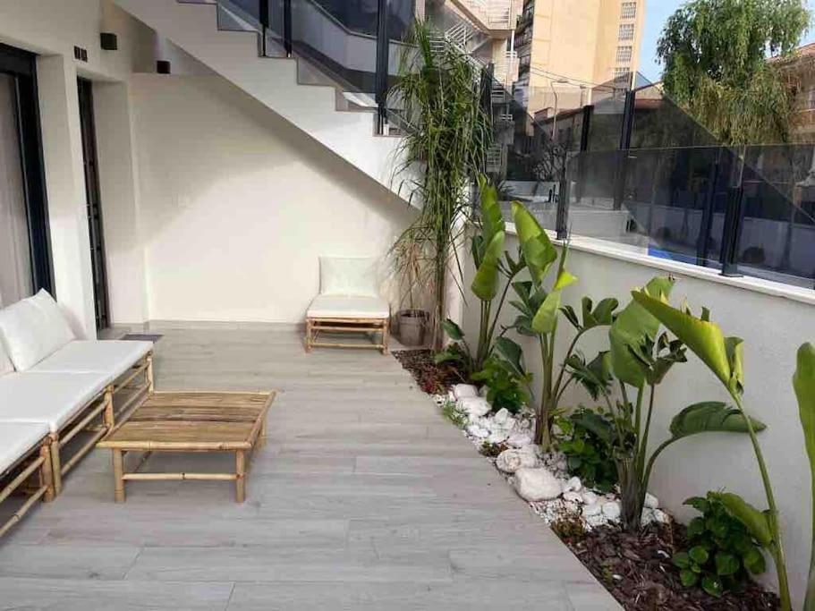 Frontsea Beach bungalow with swiming pool and long terrace