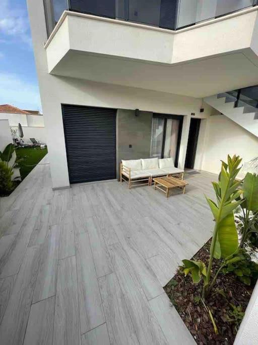 Frontsea Beach bungalow with swiming pool and long terrace