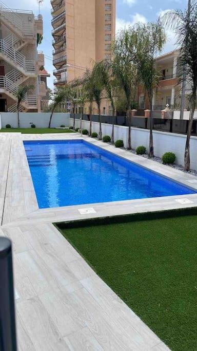 Frontsea Beach bungalow with swiming pool and long terrace