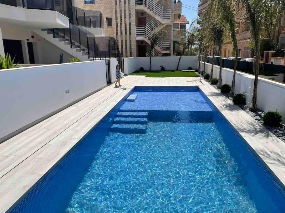 Frontsea Beach bungalow with swiming pool and long terrace
