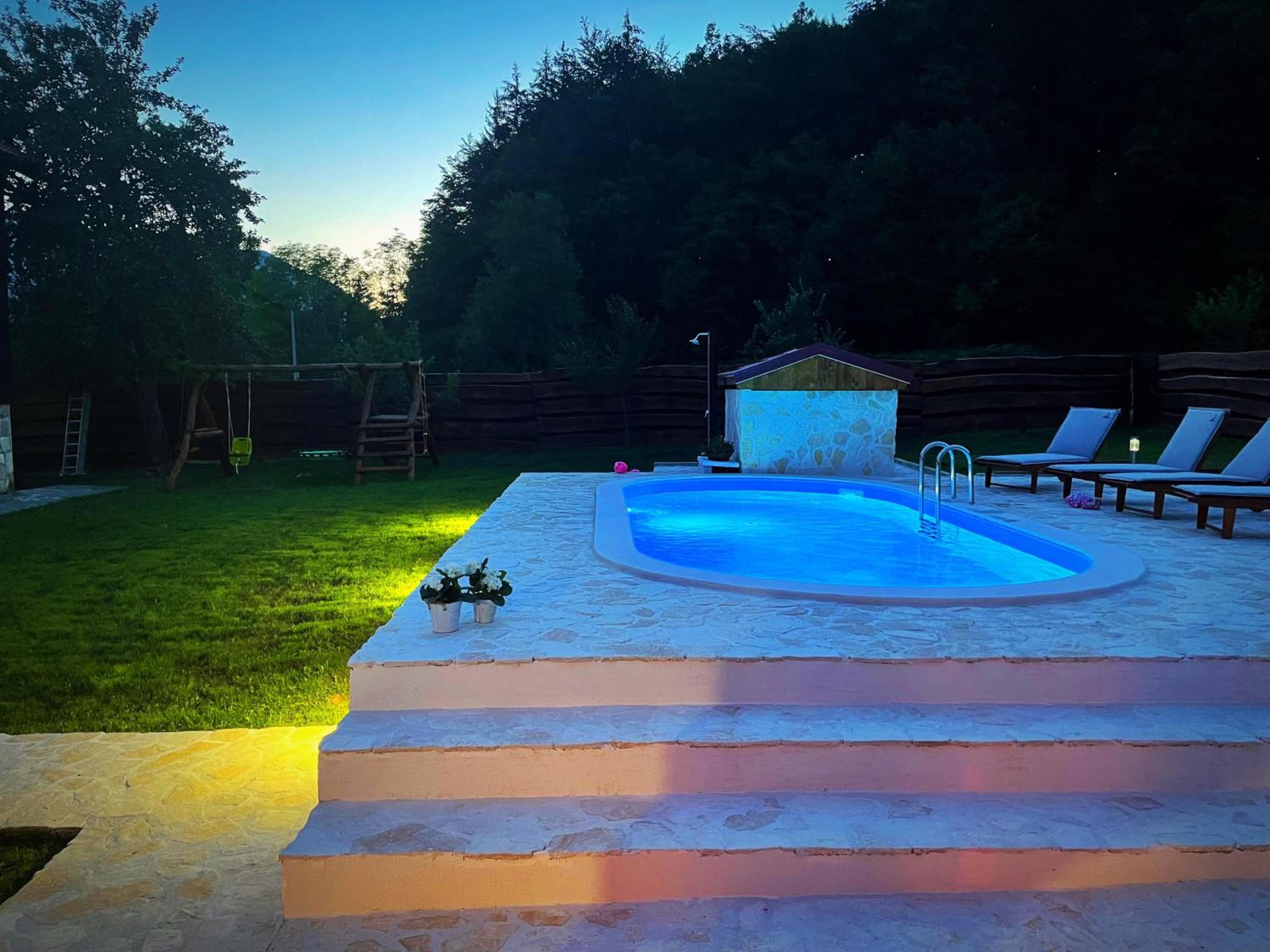 Nina Holiday Home with a heated pool view 5