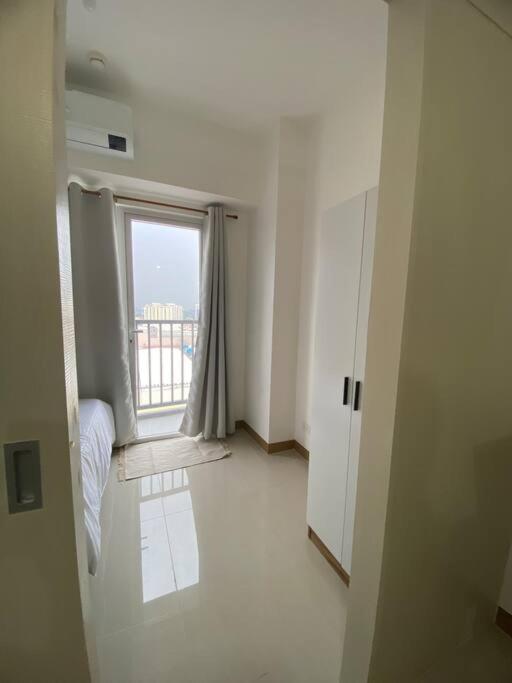 1BR unit in South Residence Las Pinas with Wifi & Netflix view 2