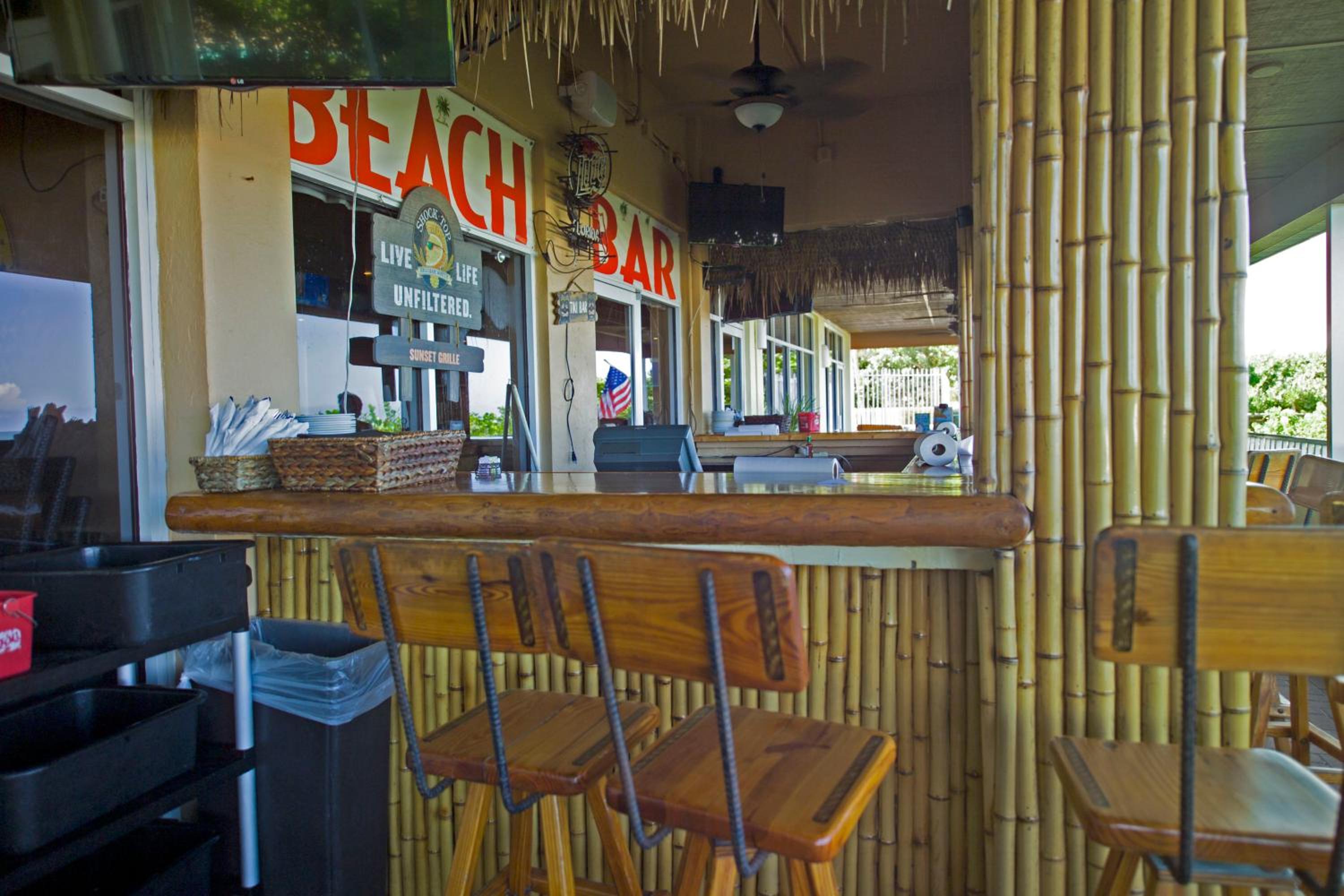 Beachfront Living at the Apollo I On-Site Sunset Grille Tiki/Restaurant
