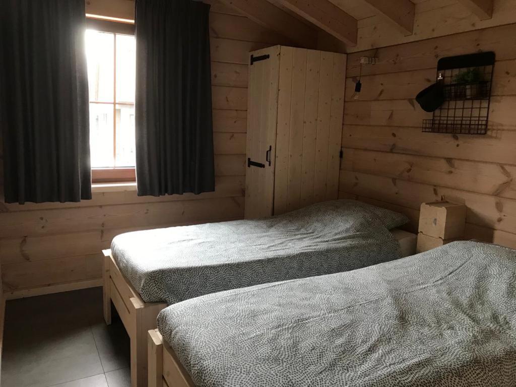 Chalet Momage dichtbij Skiliften, Skiverhuur en Bikepark!