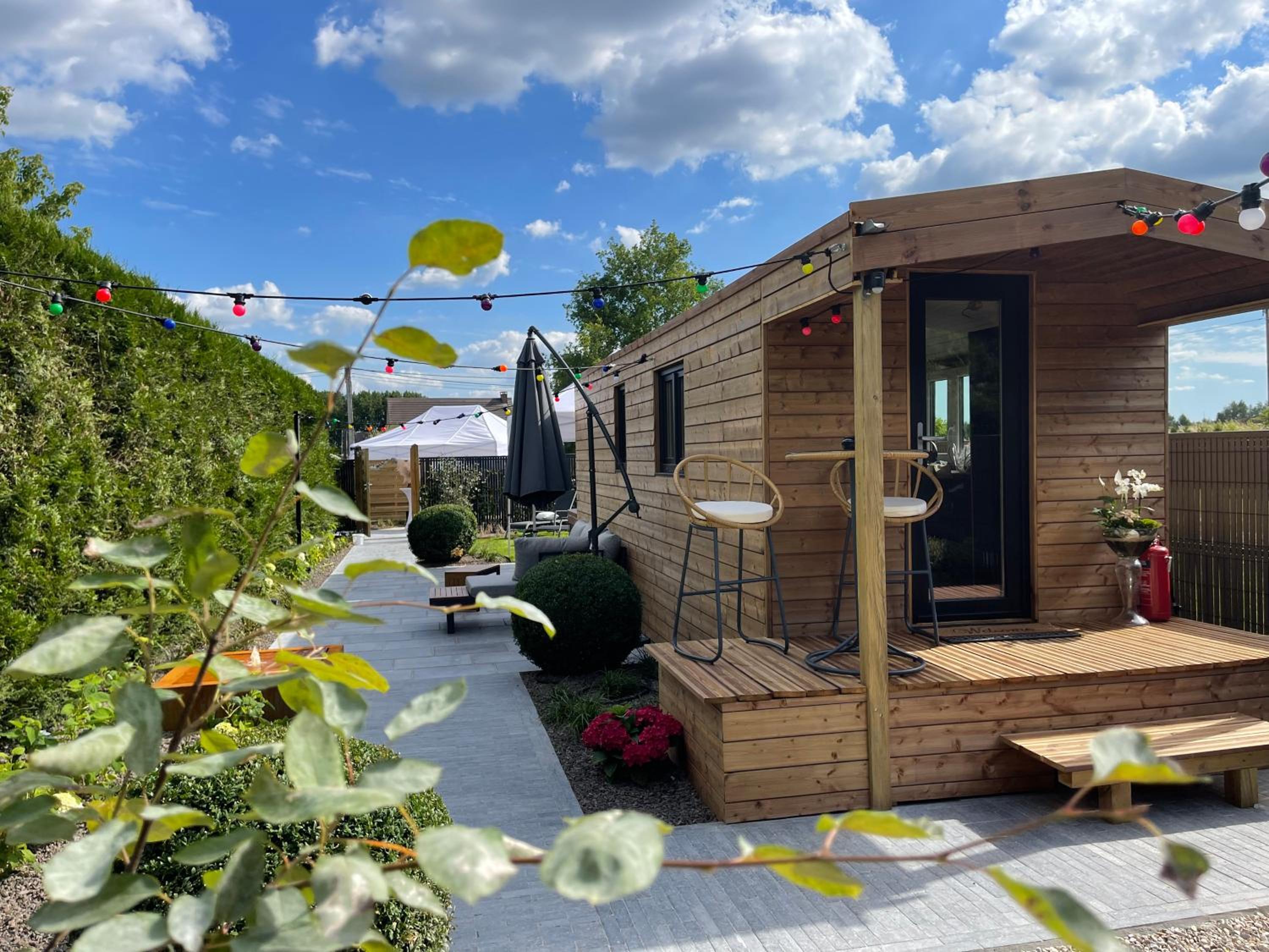 Roulotte du puits avec jacuzzi et sauna privatif