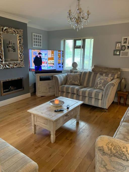 Spacious 2 BR home close to town & coast + parking view 5
