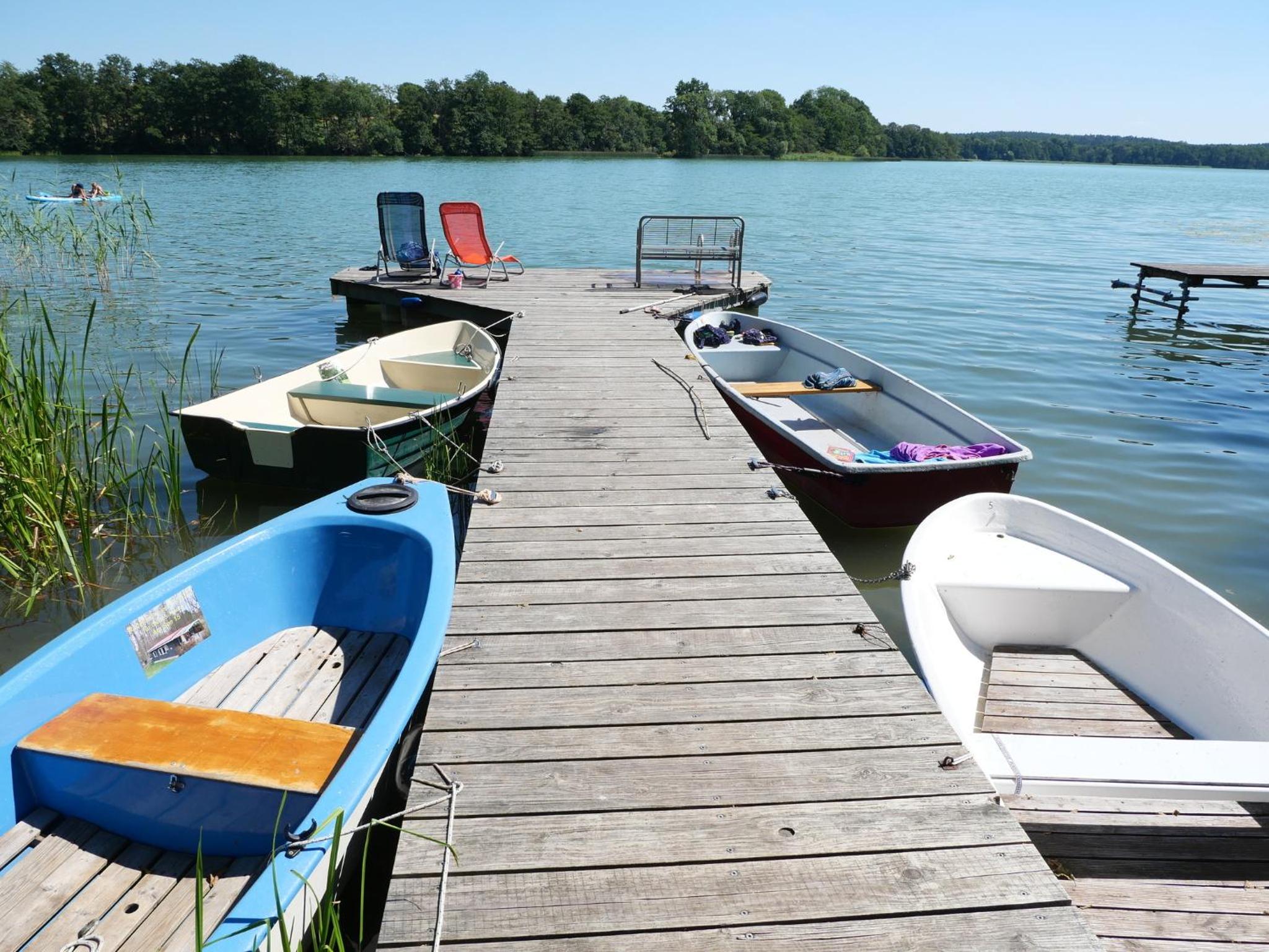 "Goldenes Haus am See mit Boot" view 5