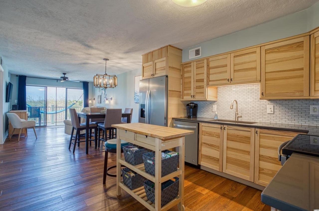 BEAUTIFUL BEACHFRONT-Oceanfront First Floor 2BR 2BA Condo in Cherry Grove, North Myrtle Beach! RENOVATED with a Fully Equipped Kitchen, 3 Separate Beds, Po view 4