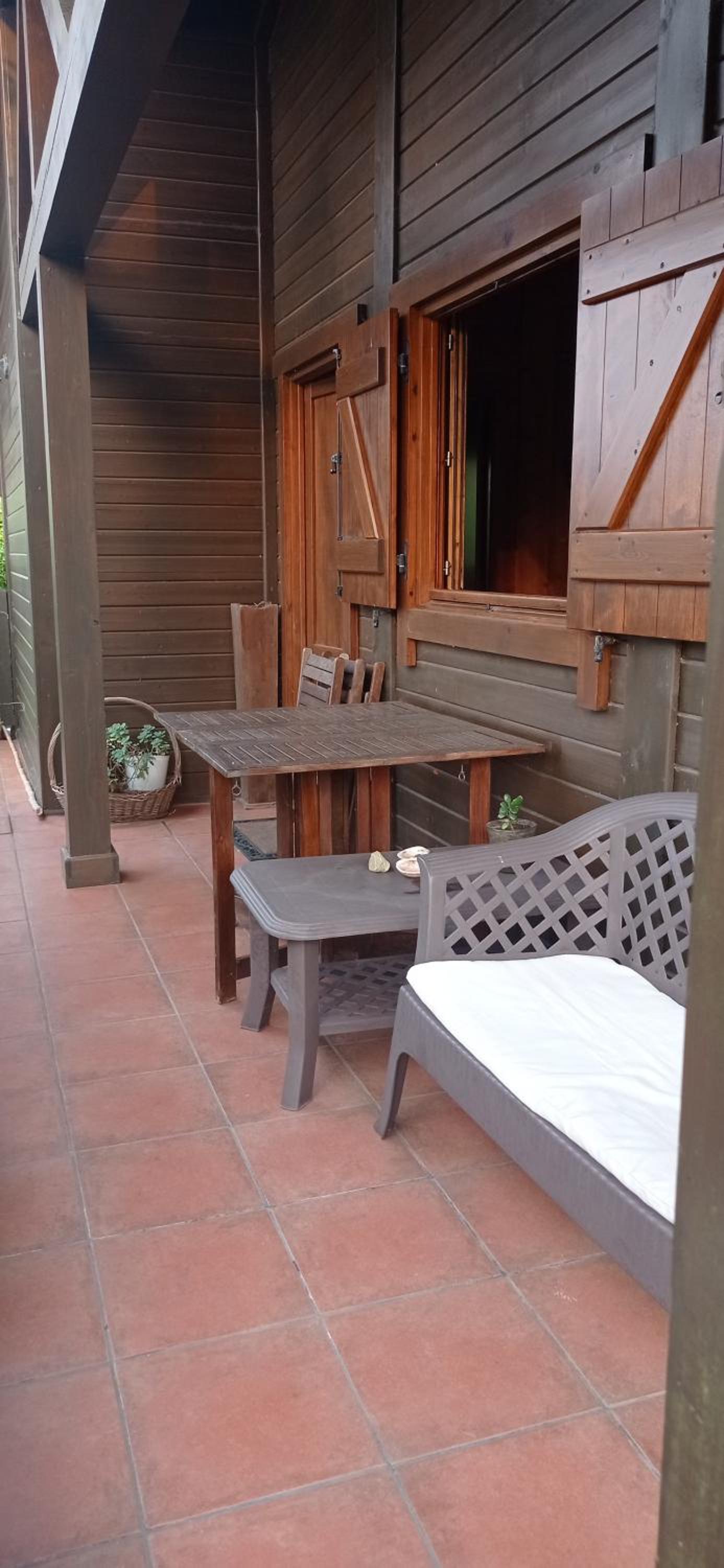 Acogedora cabaña con piscina