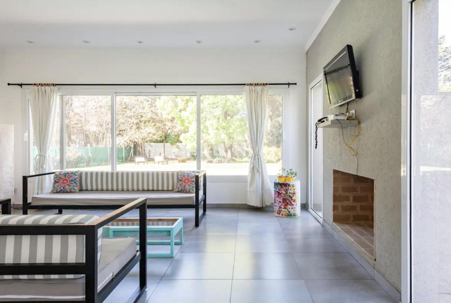 Casa tranquila cerca del Hospital Austral IAE piscina climatizada