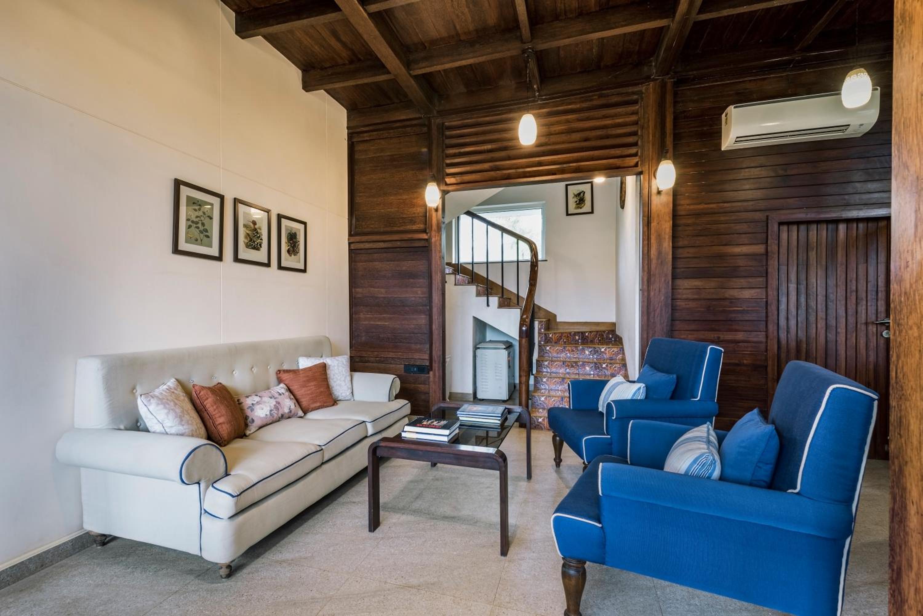 SaffronStays Boulevard LogHouse - a wooden chalet amidst nature view 4
