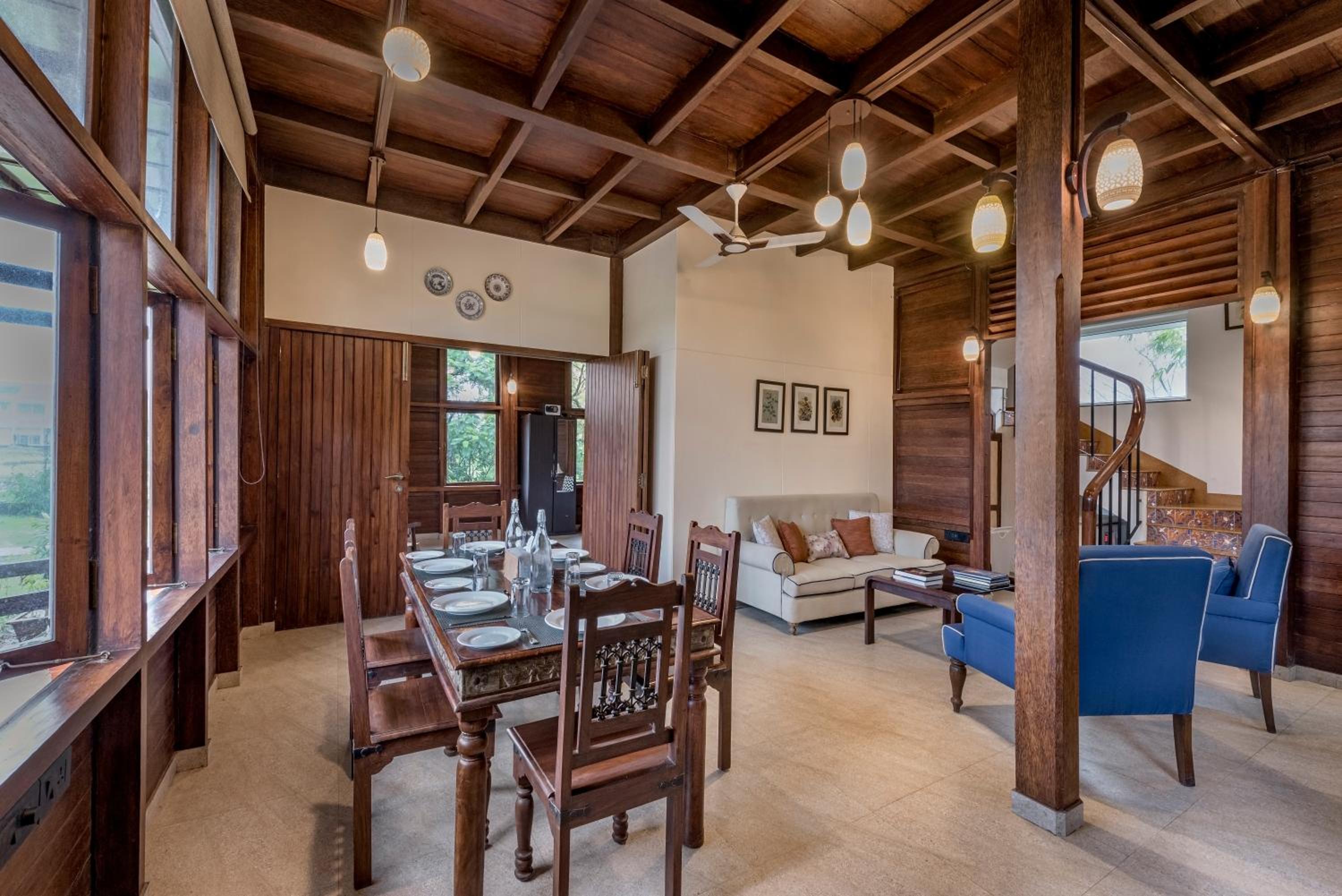 SaffronStays Boulevard LogHouse - a wooden chalet amidst nature view 5