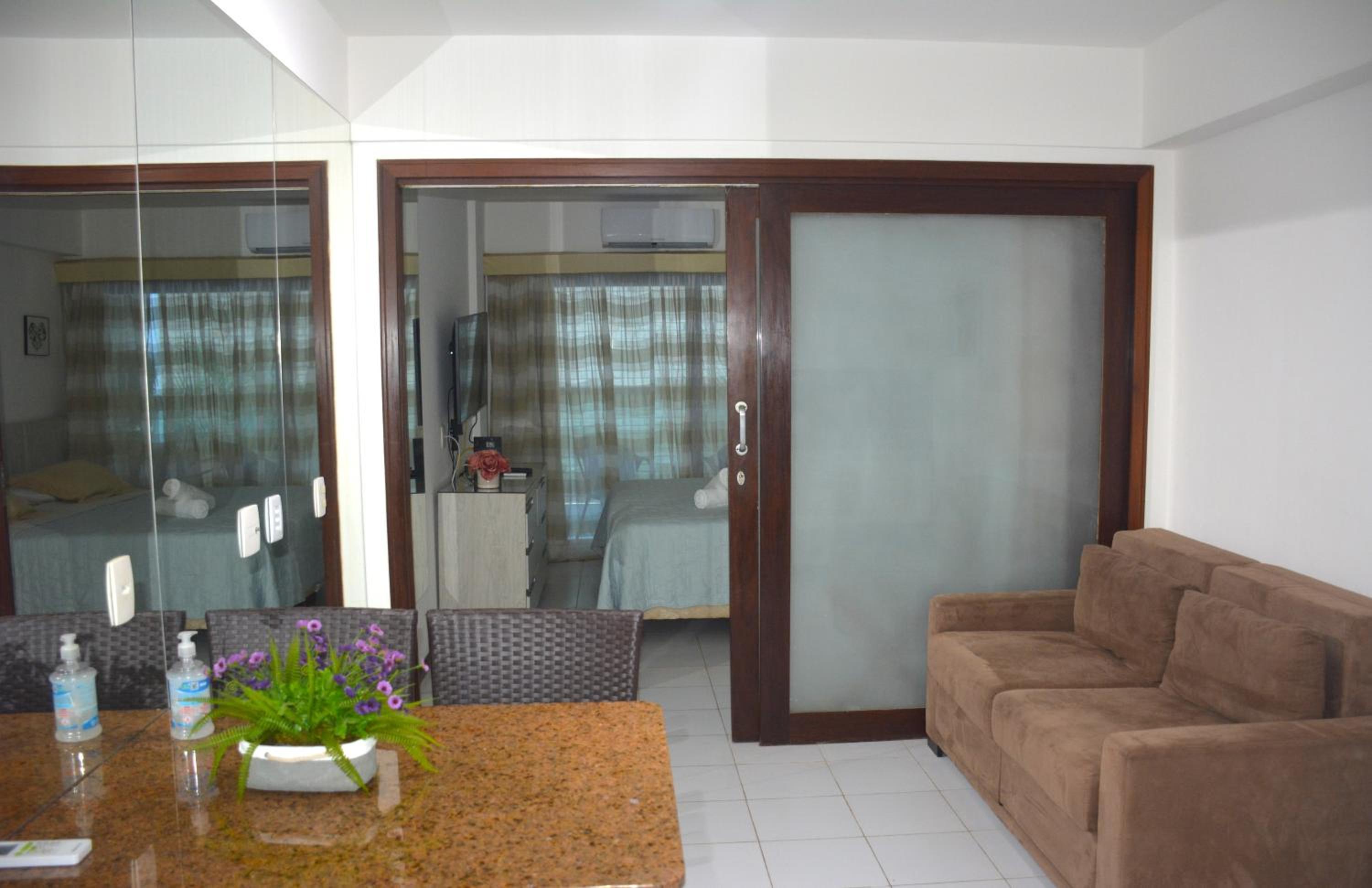 Na praia - Araça 206 Luxo - Lateral vista jardim