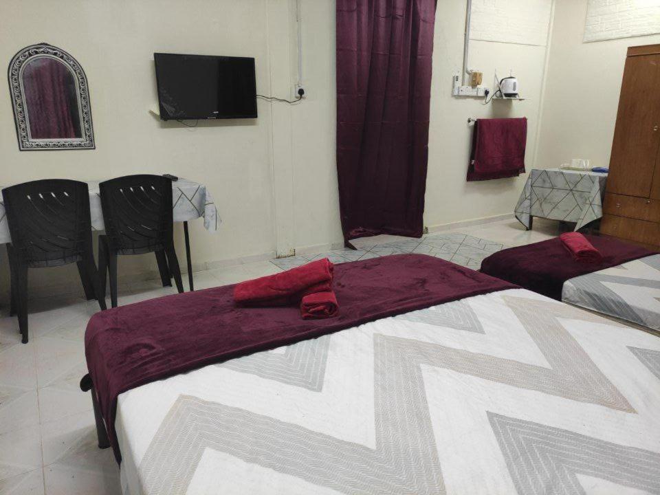 CiTY Roomstay Budget Midtown Kuala Terengganu 2queen beds photo 1