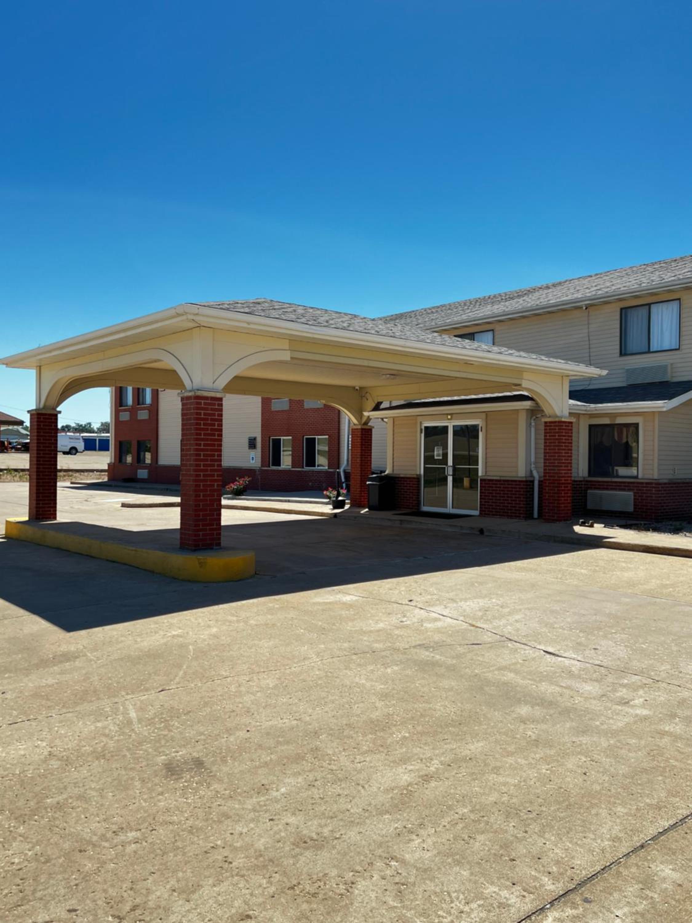Designer Inn and Suites