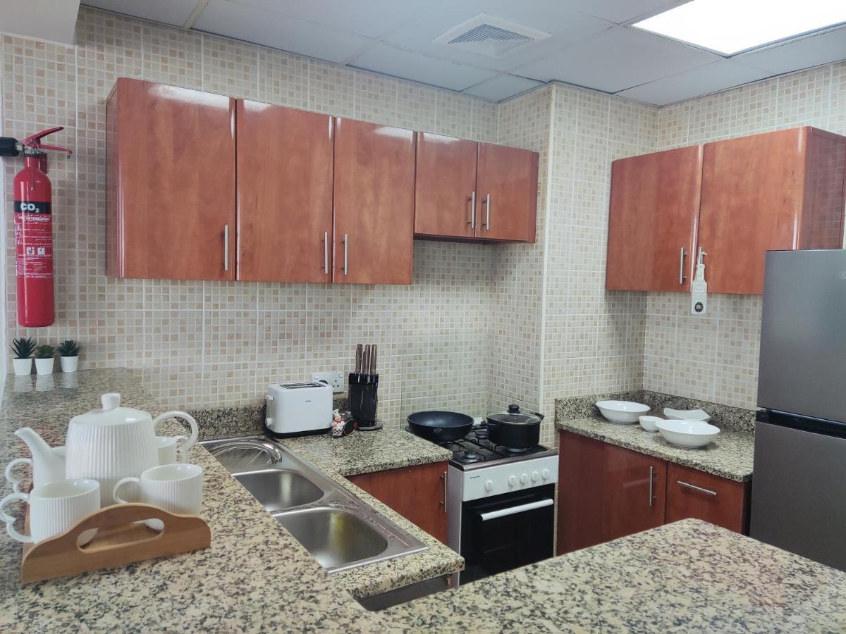 Cozy 1BR Apartment close to Dragon Market and Global Village