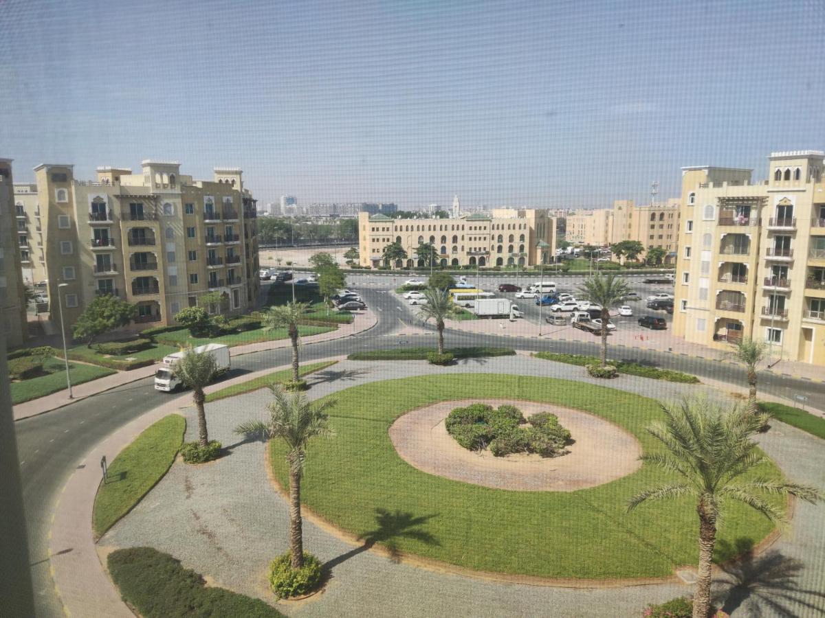 Cozy 1BR Apartment close to Dragon Market and Global Village