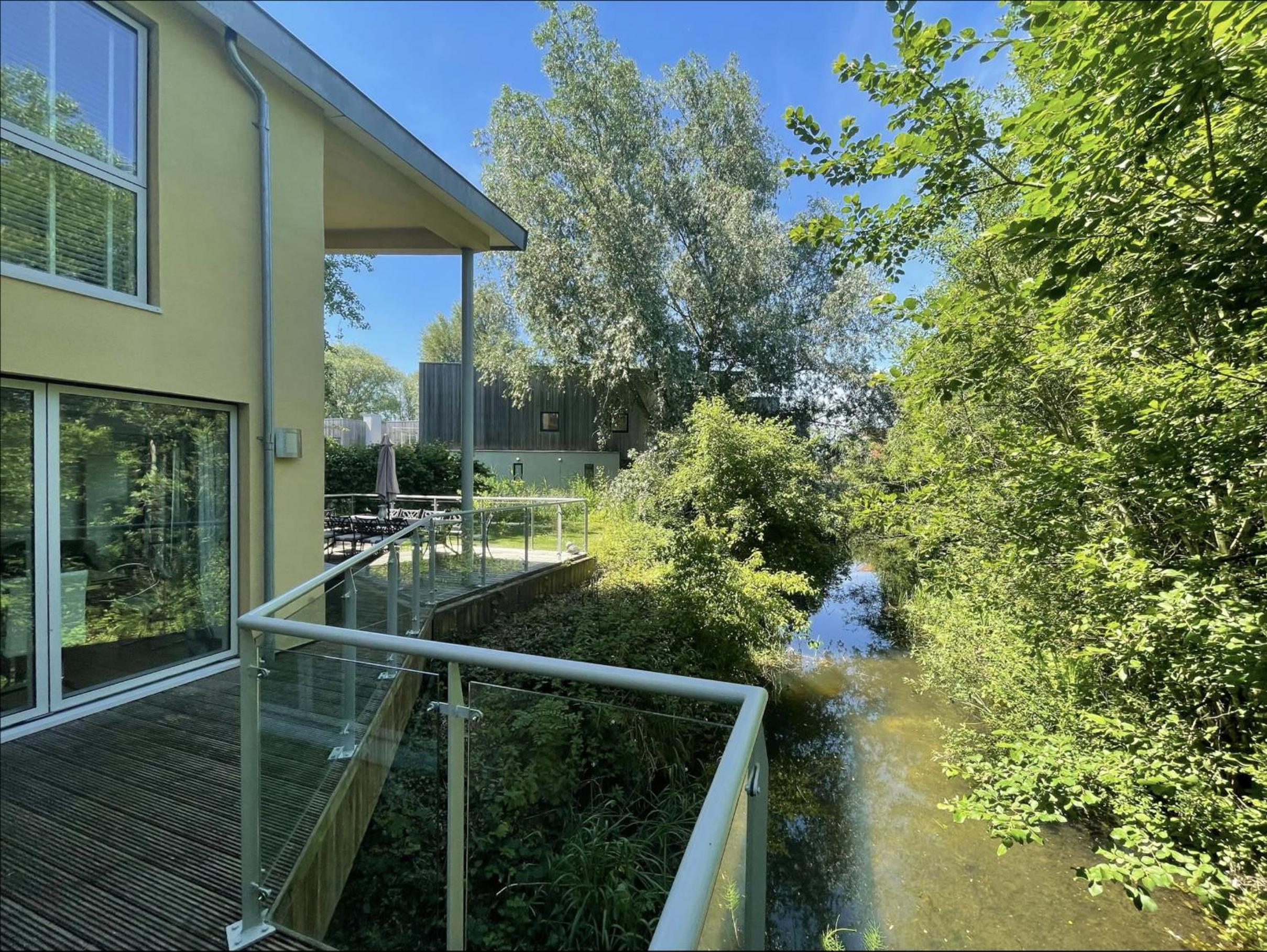 Modern contemporary home in beautiful setting view 3