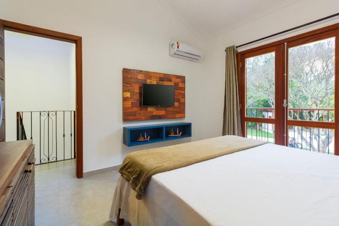 Casa Andorinha 3 Quartos com ar condicionado, piscina privativa, área gourmet, próximo ao Centro Histórico e roupa de cama e banho de qualidade