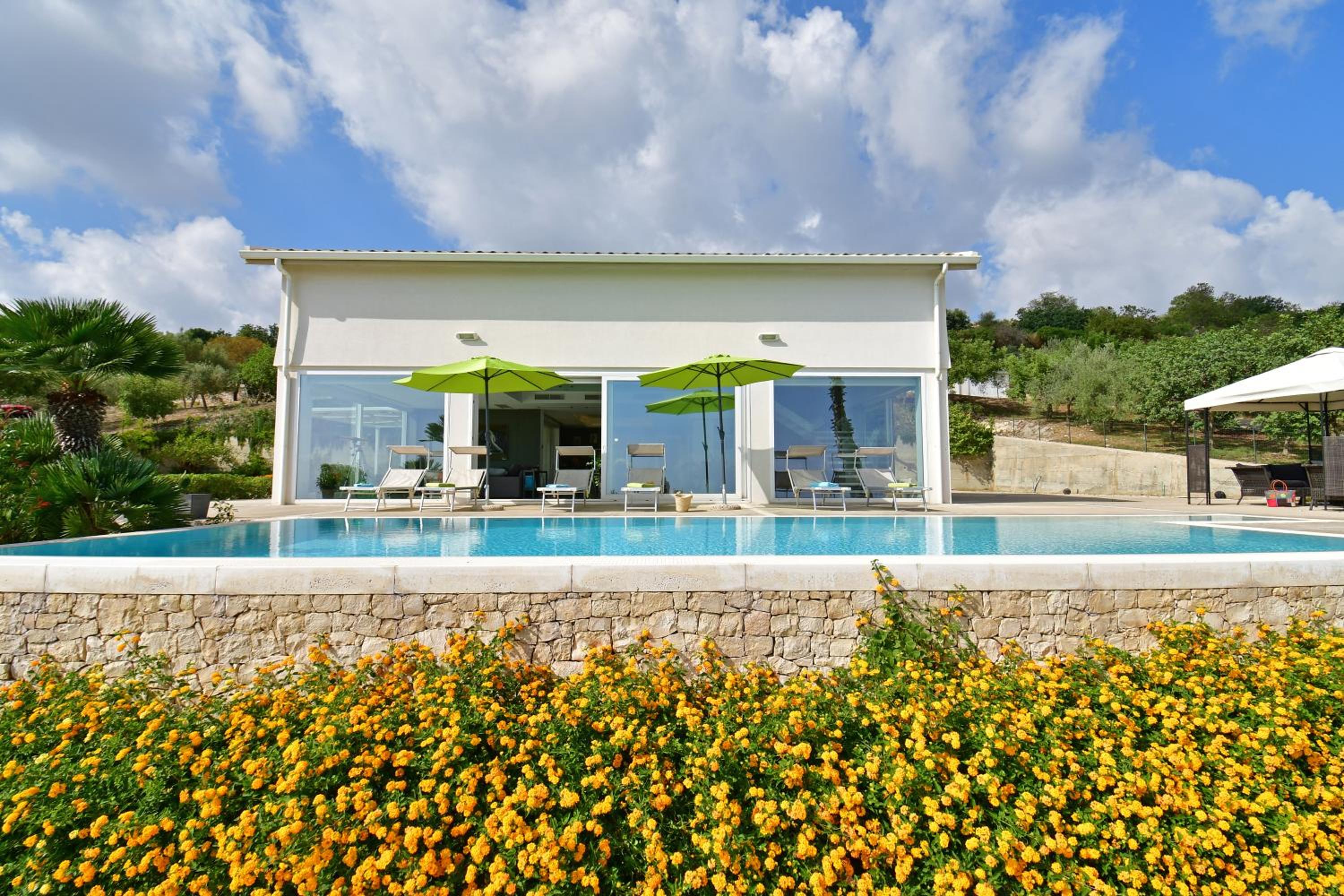 Villa Nausica, heated pool, Padel court, view on the sea, wifi free perfect for big group photo 3
