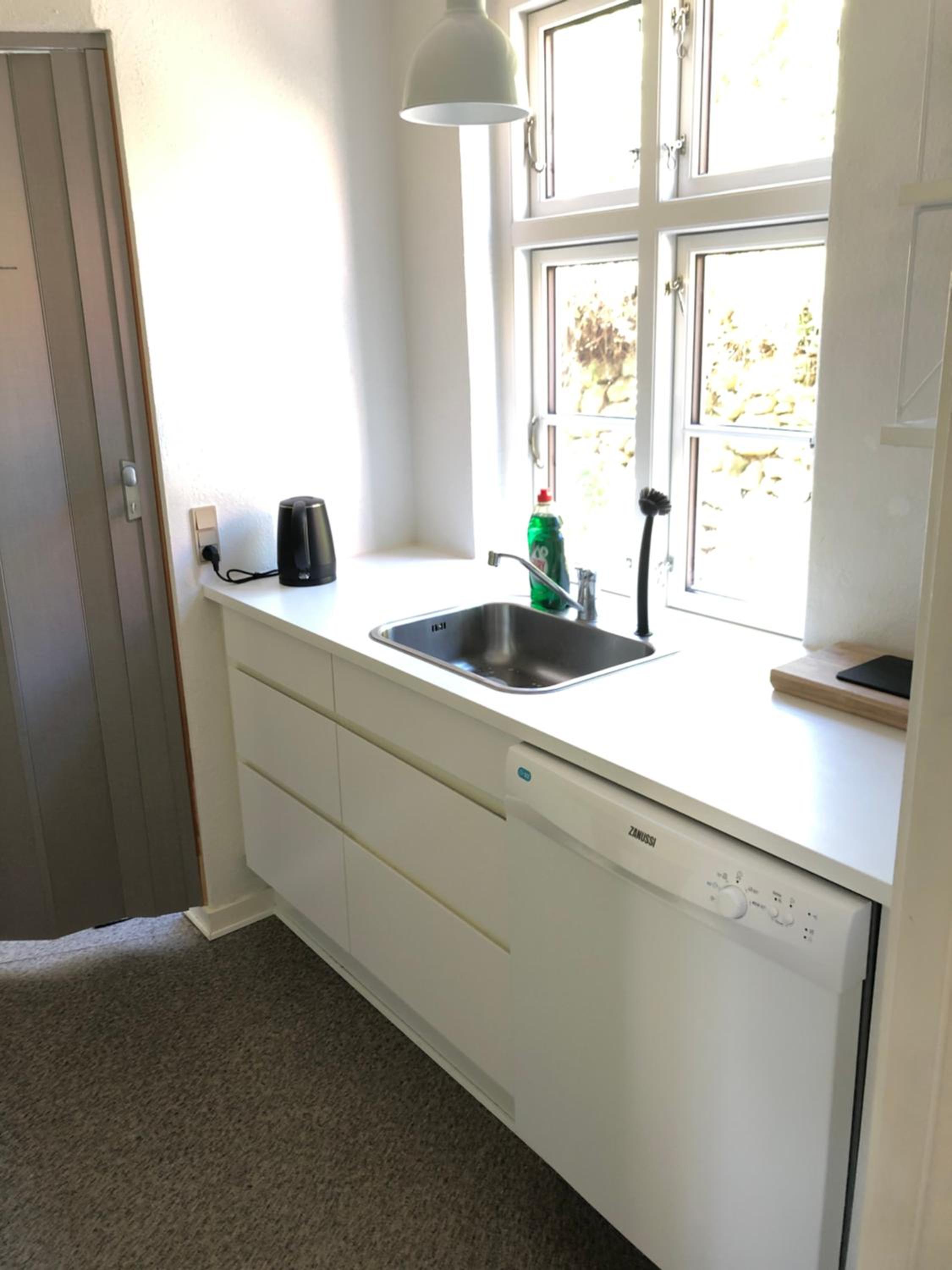 Huset ved springvandet