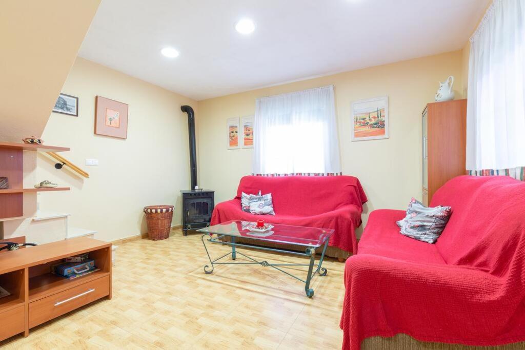 Casita entre naranjas