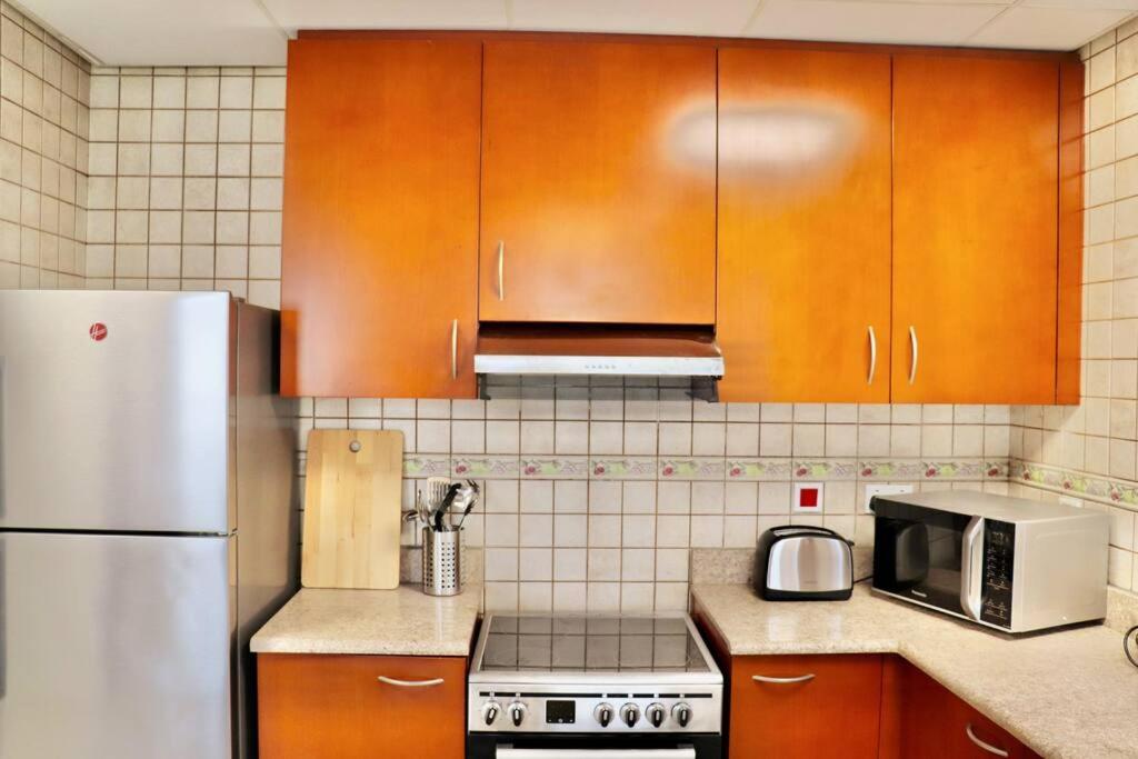 Unified Vacation Homes-Spacious Studio in lush green Motor City