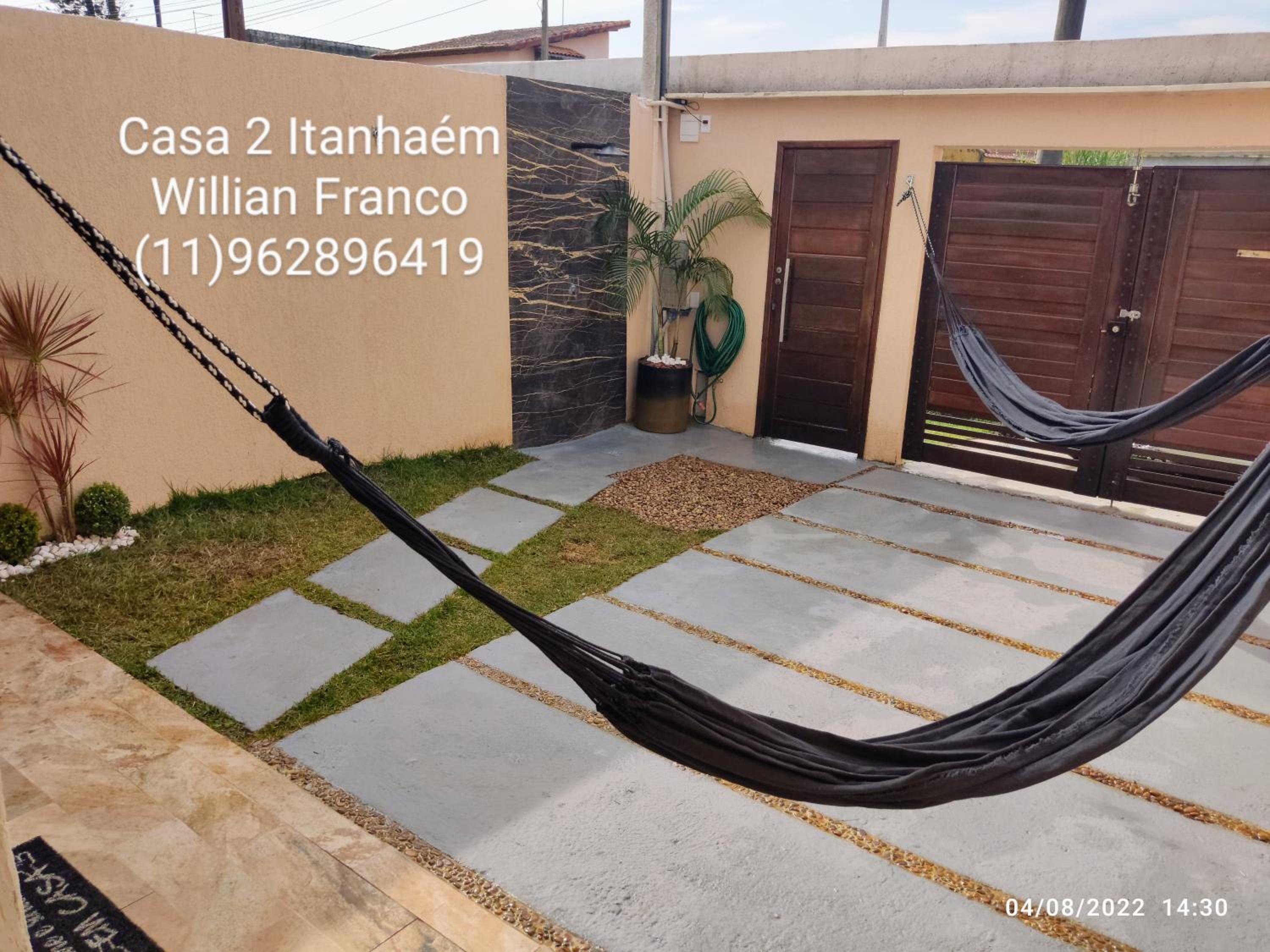 A Casa Linda Com Piscina Aquecida churrasqueira wifi pertinho da praia em Itanhaém