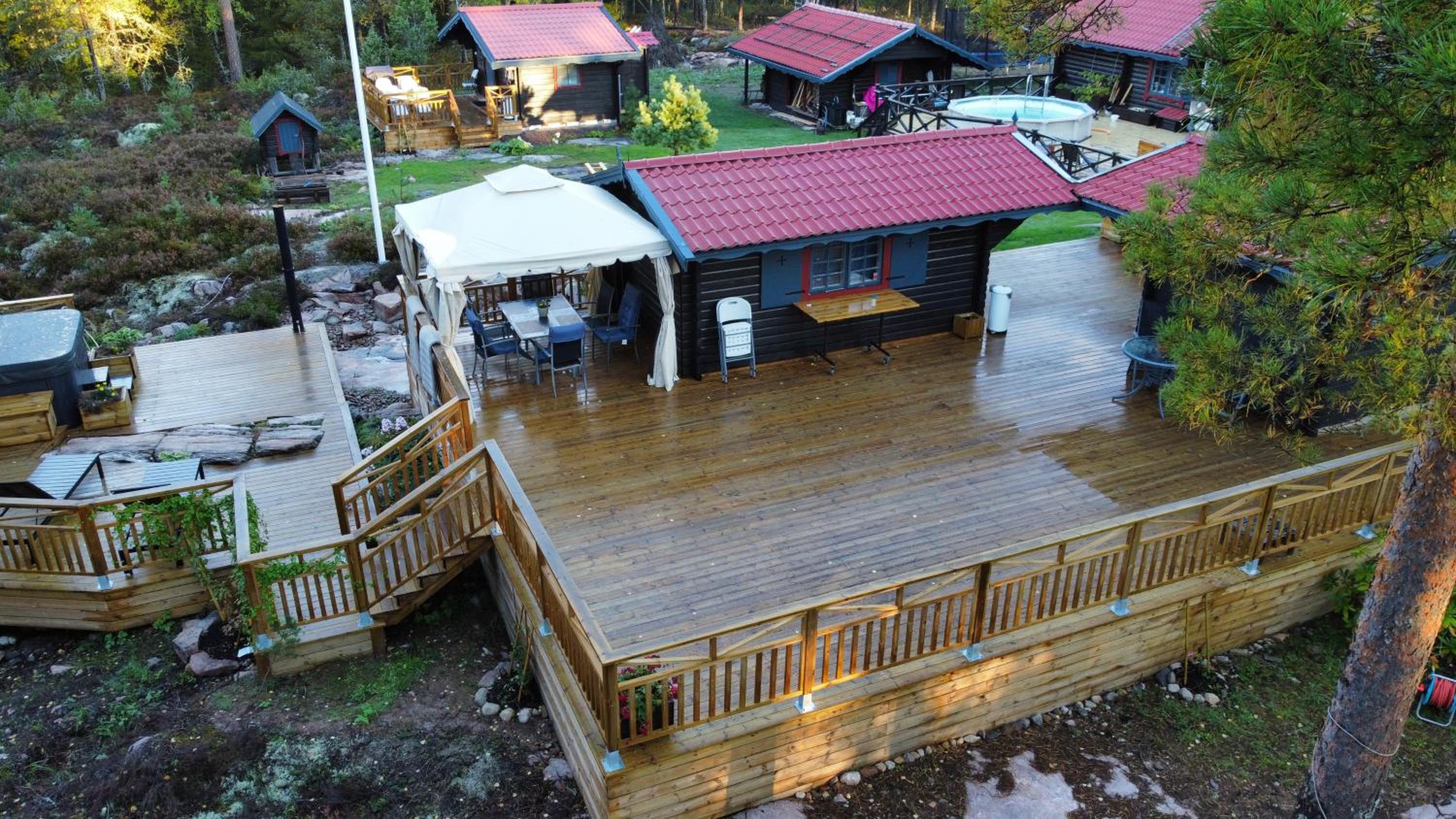 Timber cottages with jacuzzi and sauna near lake Vänern view 5