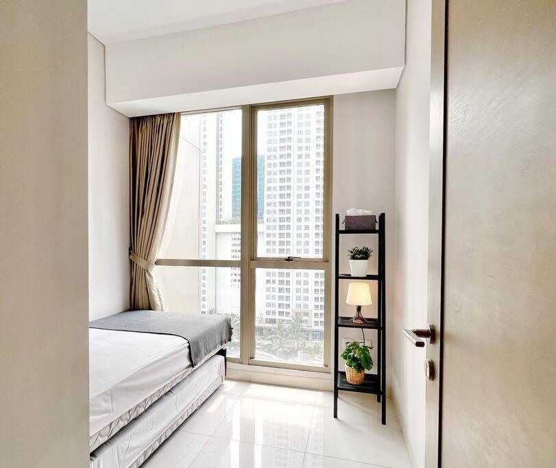 Cozy 3BR Suite at Taman Anggrek view 2