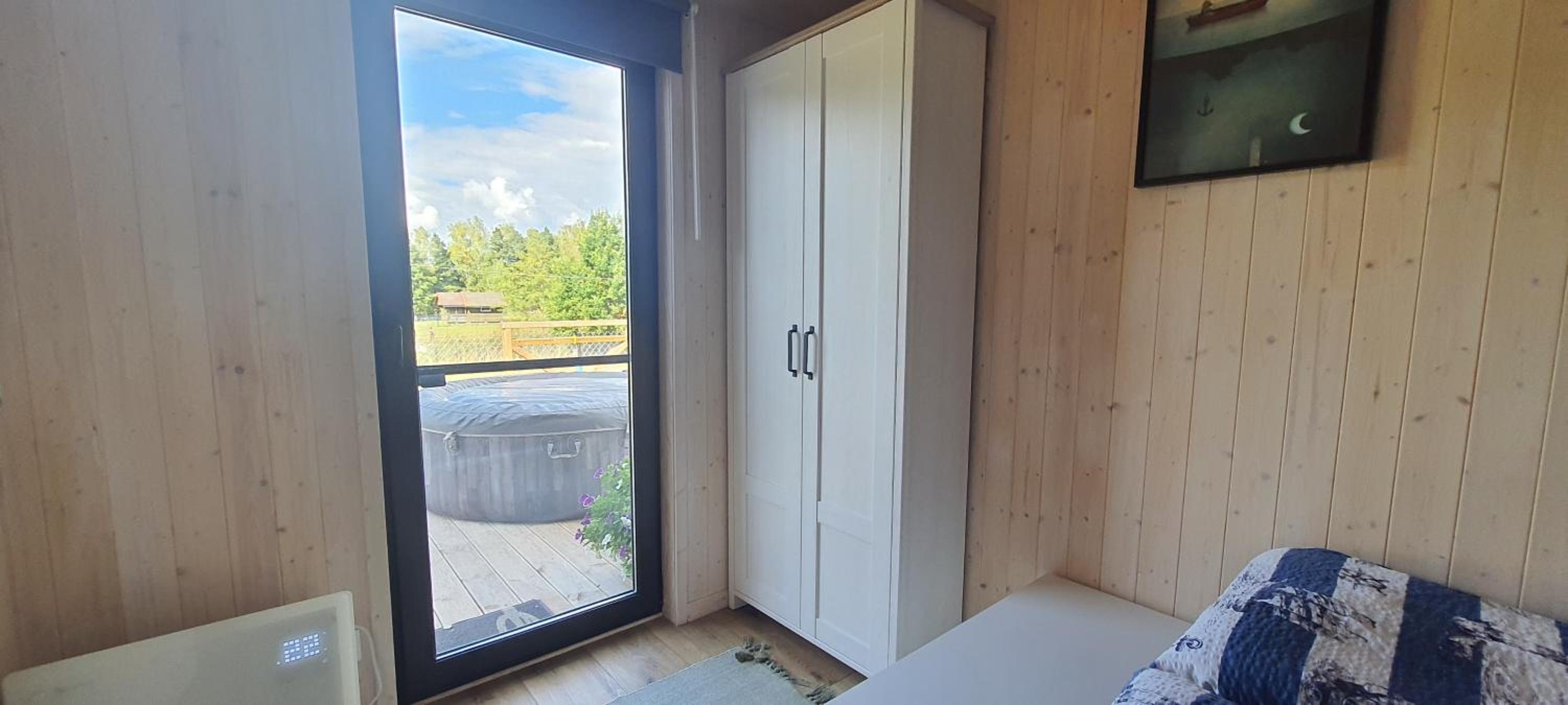 Domek Mazurski całoroczny nad jeziorem z sauną i Jacuzzi SPA