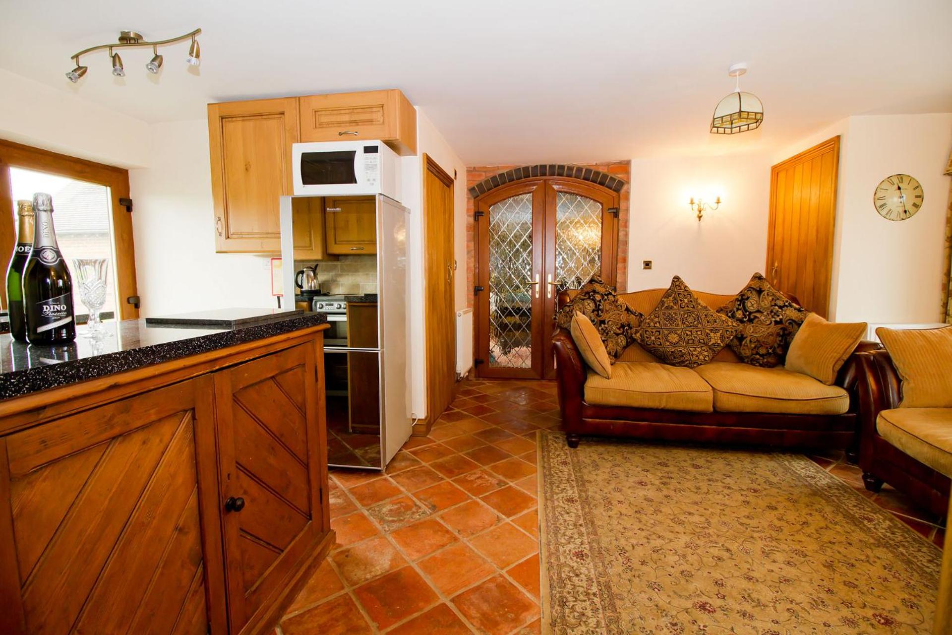 Coach House at Oaks Barn Farm Alcester with optional hire Salt water hot tub view 2