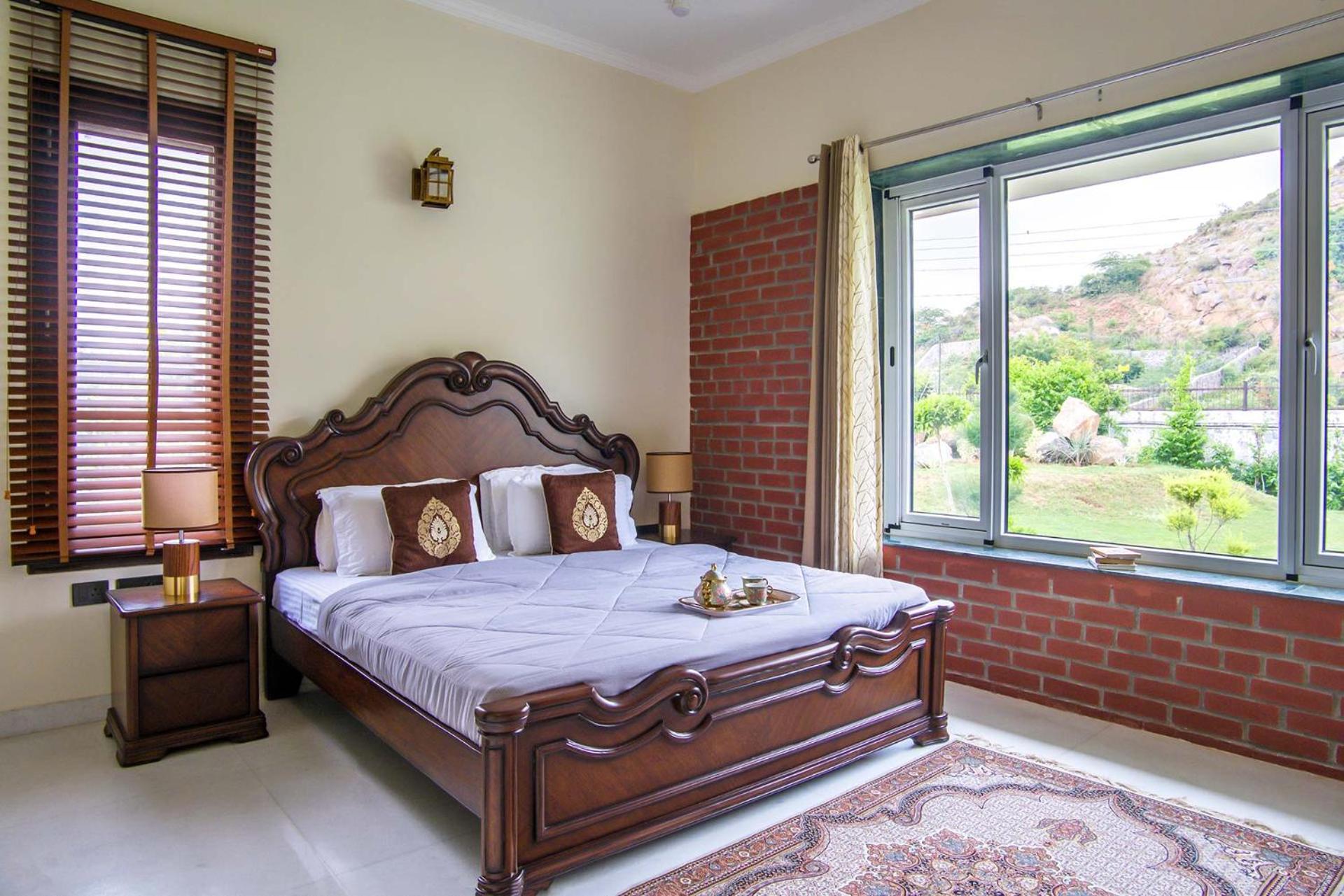 StayVista at Hillside Paradise in Sohna with Jacuzzi, kids play area, view of Aravalli Hills view 2