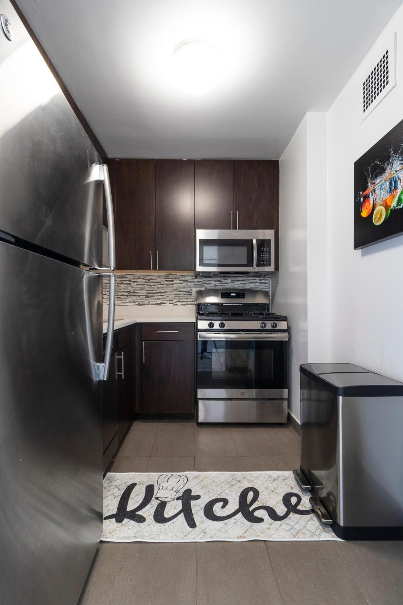 LUXURY DESIGNER GREENWICH VILLAGE 1BR HEAVEN!! BEAUTIFUL PANORAMIC CITY VIEWS!